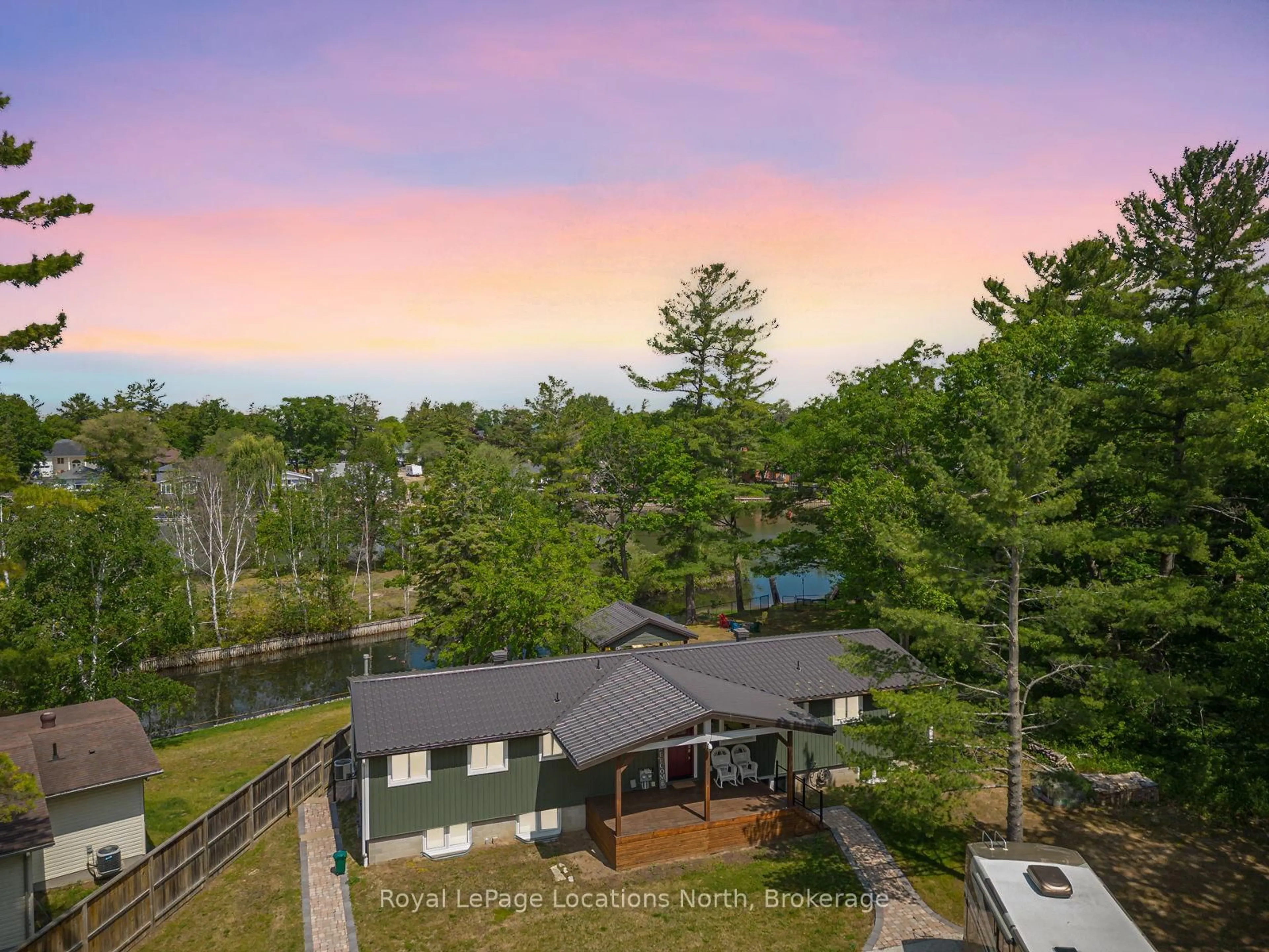 A pic from outside/outdoor area/front of a property/back of a property/a pic from drone, water/lake/river/ocean view for 1628 River Rd, Wasaga Beach Ontario L9Z 2S3