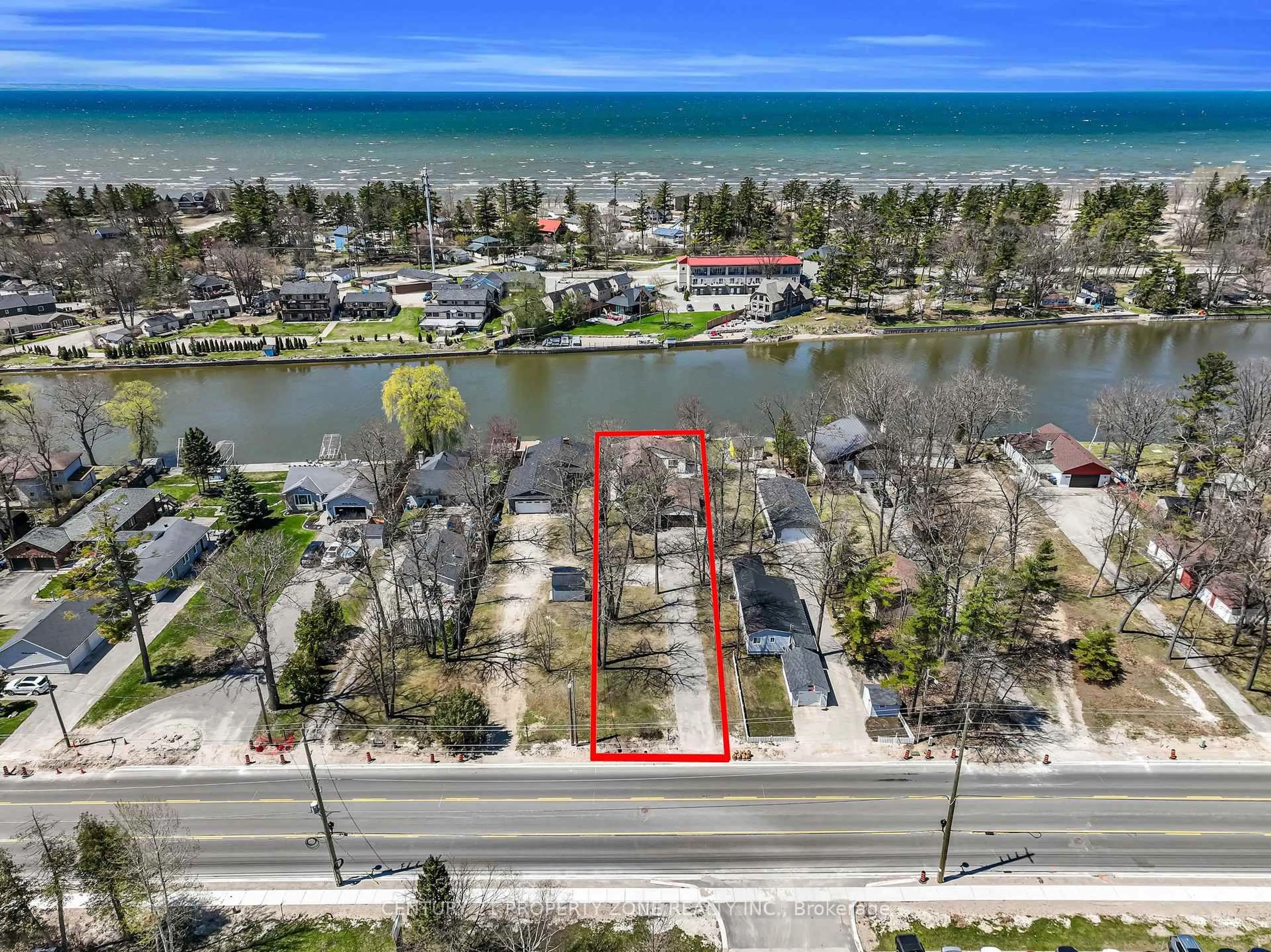 A pic from outside/outdoor area/front of a property/back of a property/a pic from drone, water/lake/river/ocean view for 1312 River Rd, Wasaga Beach Ontario L9Z 2W6