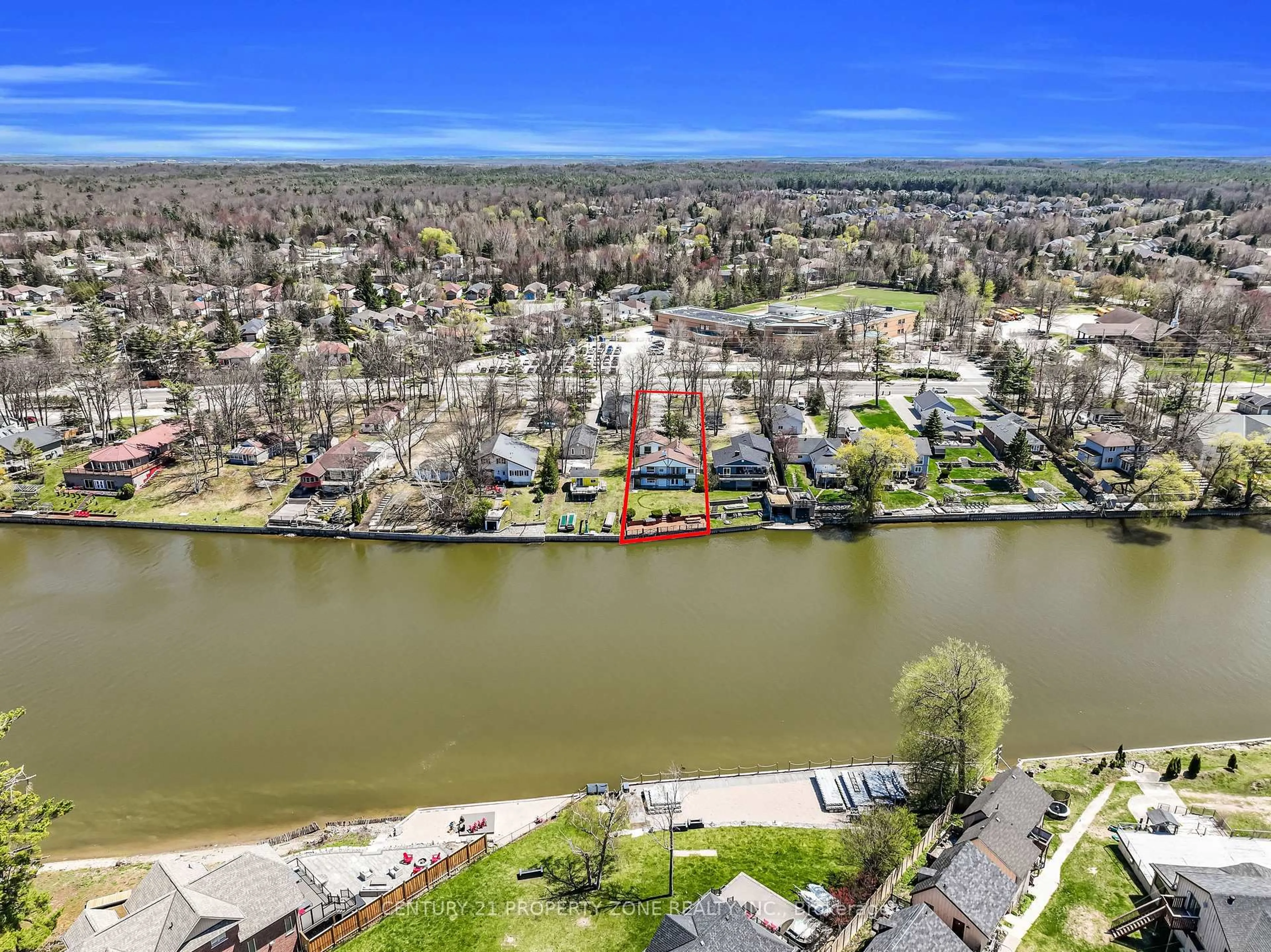 A pic from outside/outdoor area/front of a property/back of a property/a pic from drone, water/lake/river/ocean view for 1312 River Rd, Wasaga Beach Ontario L9Z 2W6