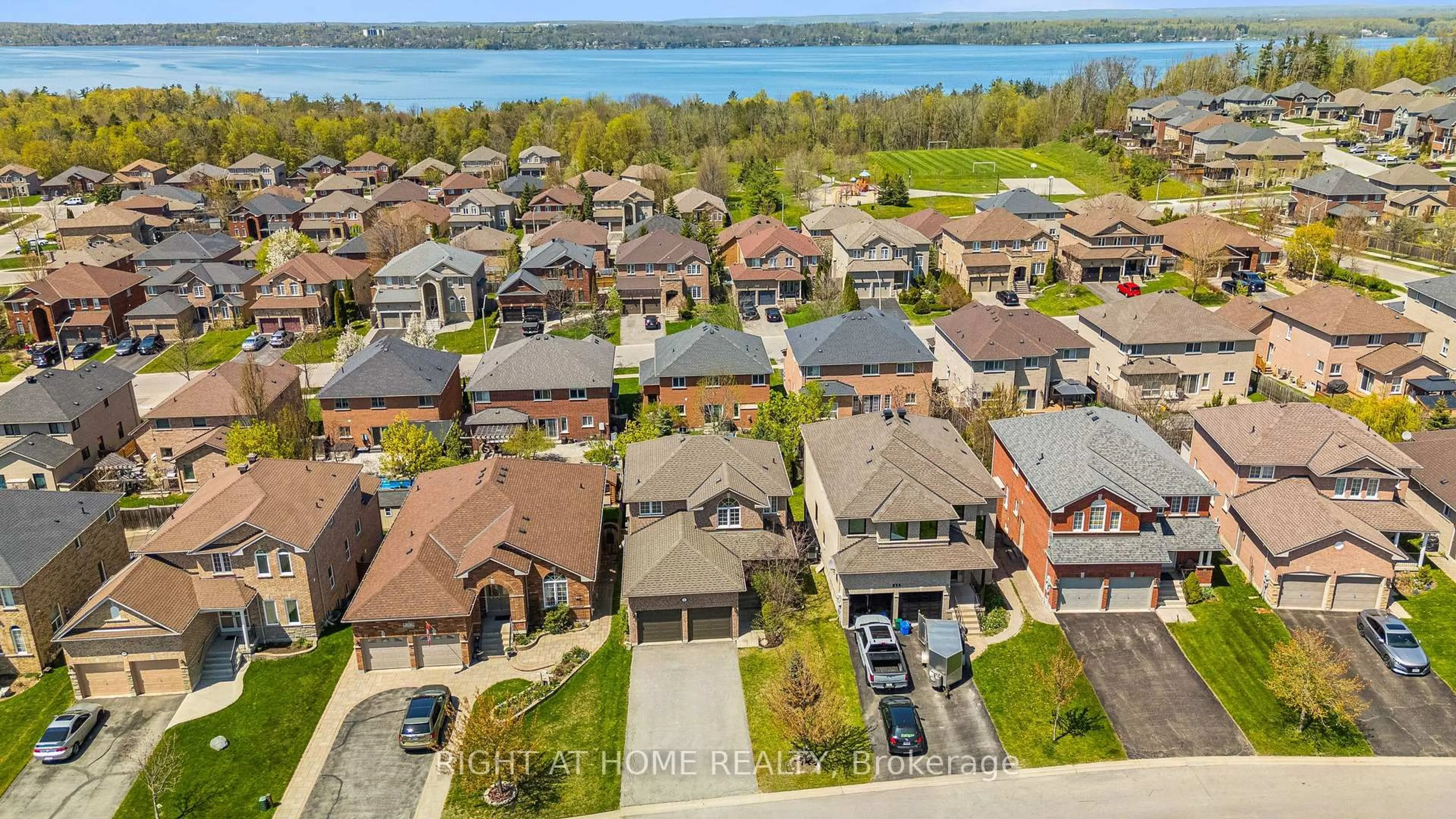 A pic from outside/outdoor area/front of a property/back of a property/a pic from drone, water/lake/river/ocean view for 14 Prince Of Wales Dr, Barrie Ontario L4N 0T5