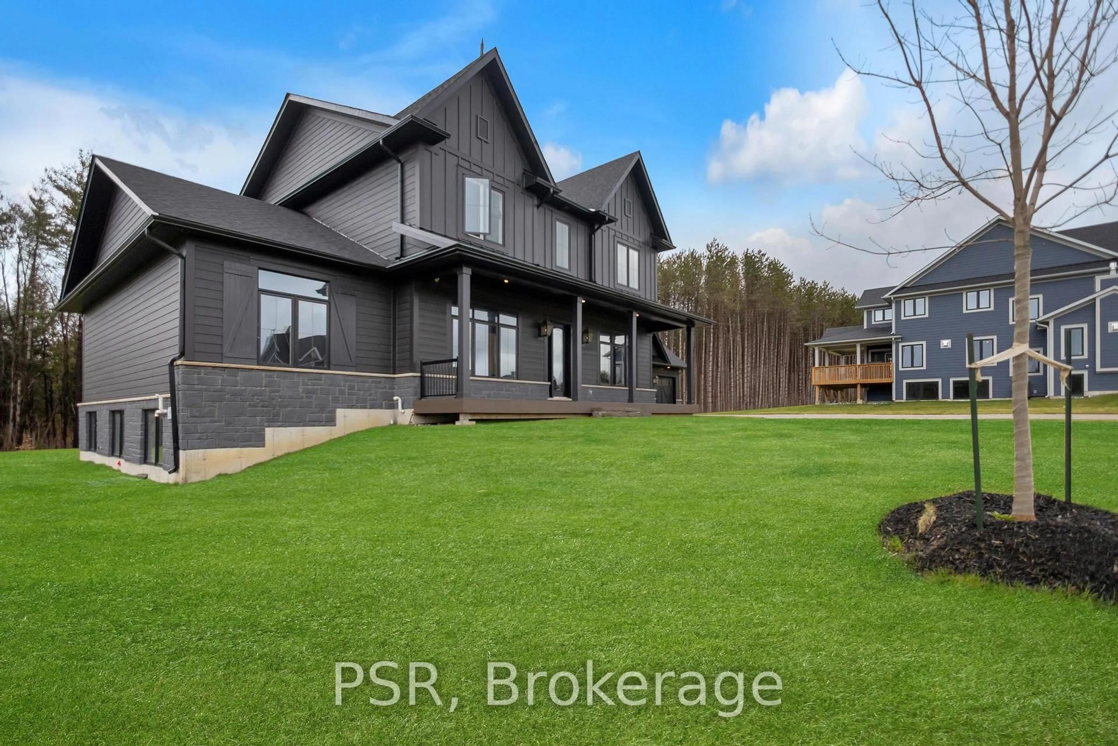 A pic from outside/outdoor area/front of a property/back of a property/a pic from drone, street for 72 Georgian Grande Dr, Oro-Medonte Ontario L0K 1E0
