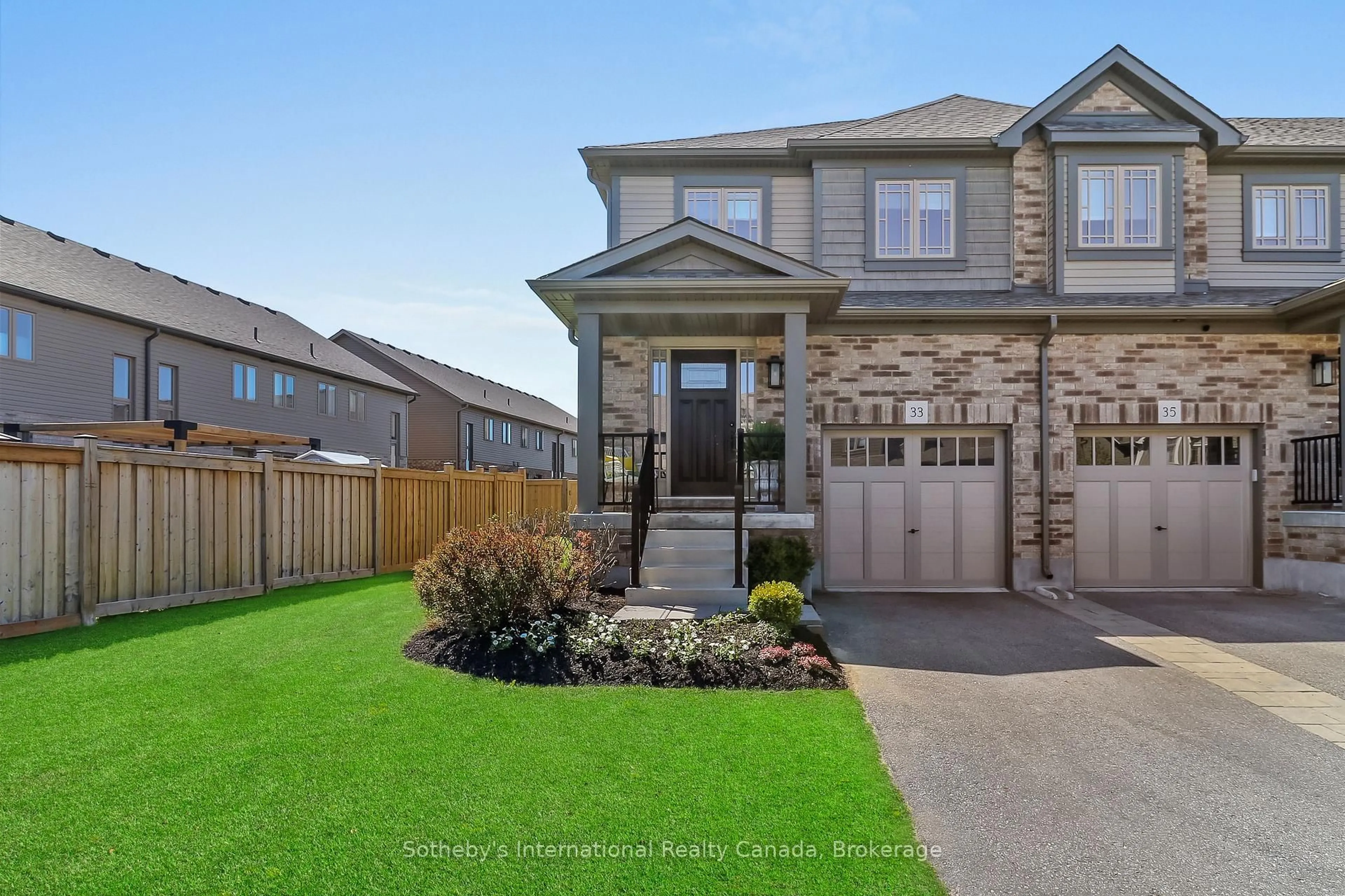 Home with brick exterior material, street for 33 Foley Cres, Collingwood Ontario L9Y 3B7