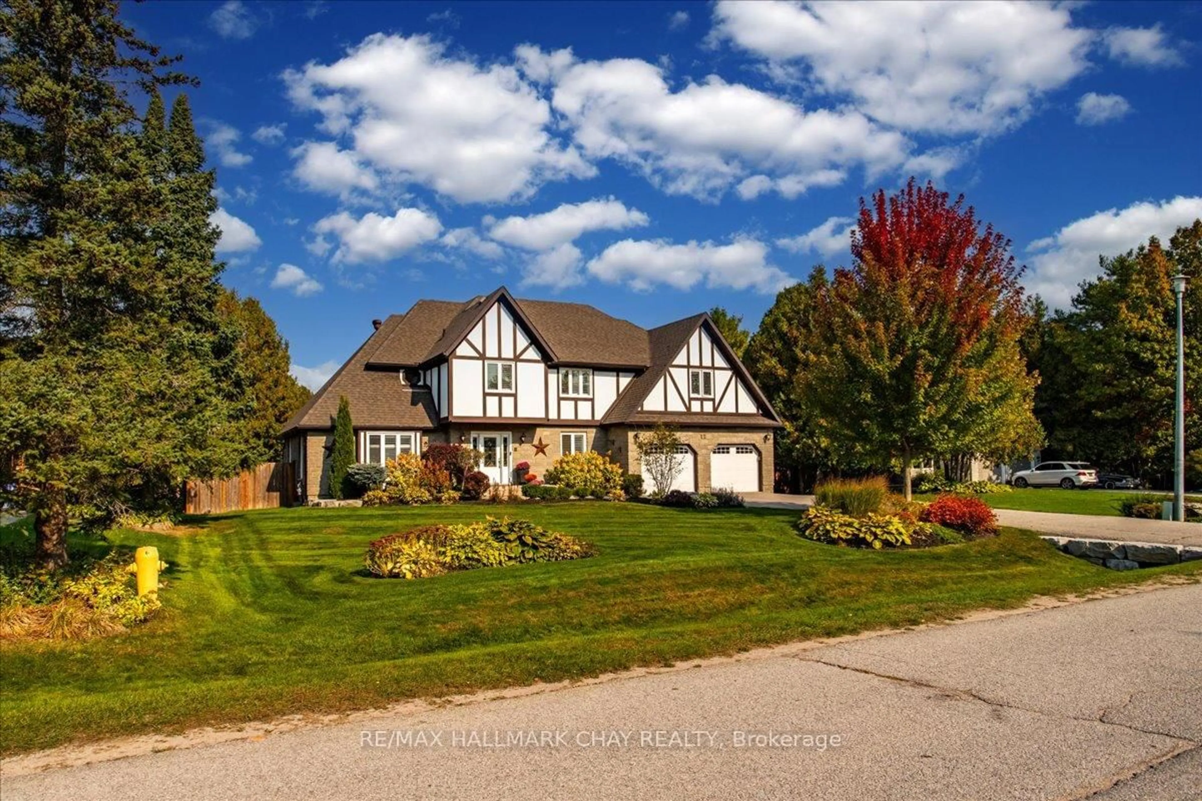 Home with brick exterior material, street for 12 Howard Dr, Oro-Medonte Ontario L0L 2E0