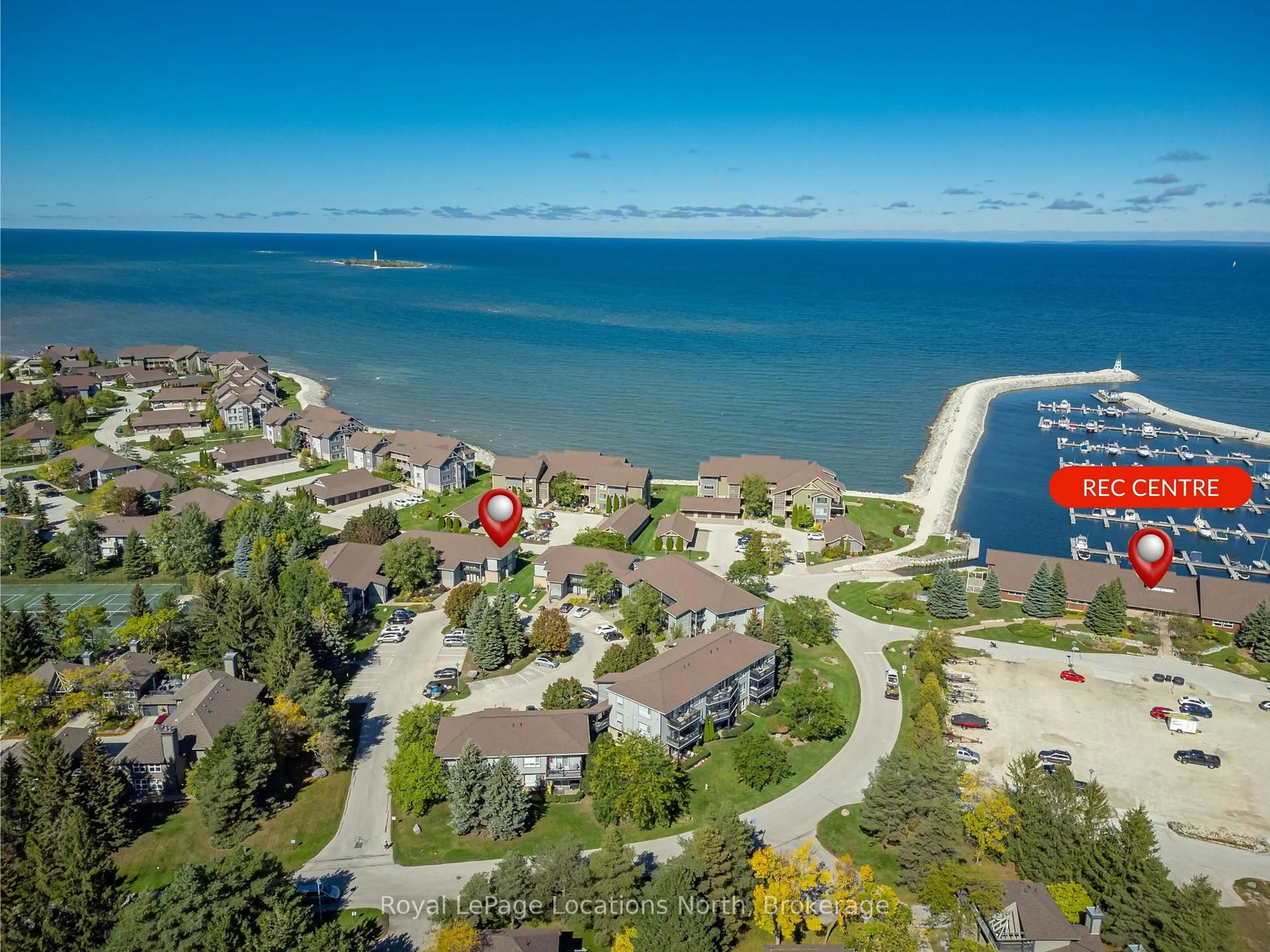 A pic from outside/outdoor area/front of a property/back of a property/a pic from drone, water/lake/river/ocean view for 465 Mariners Way, Collingwood Ontario L9Y 5C7