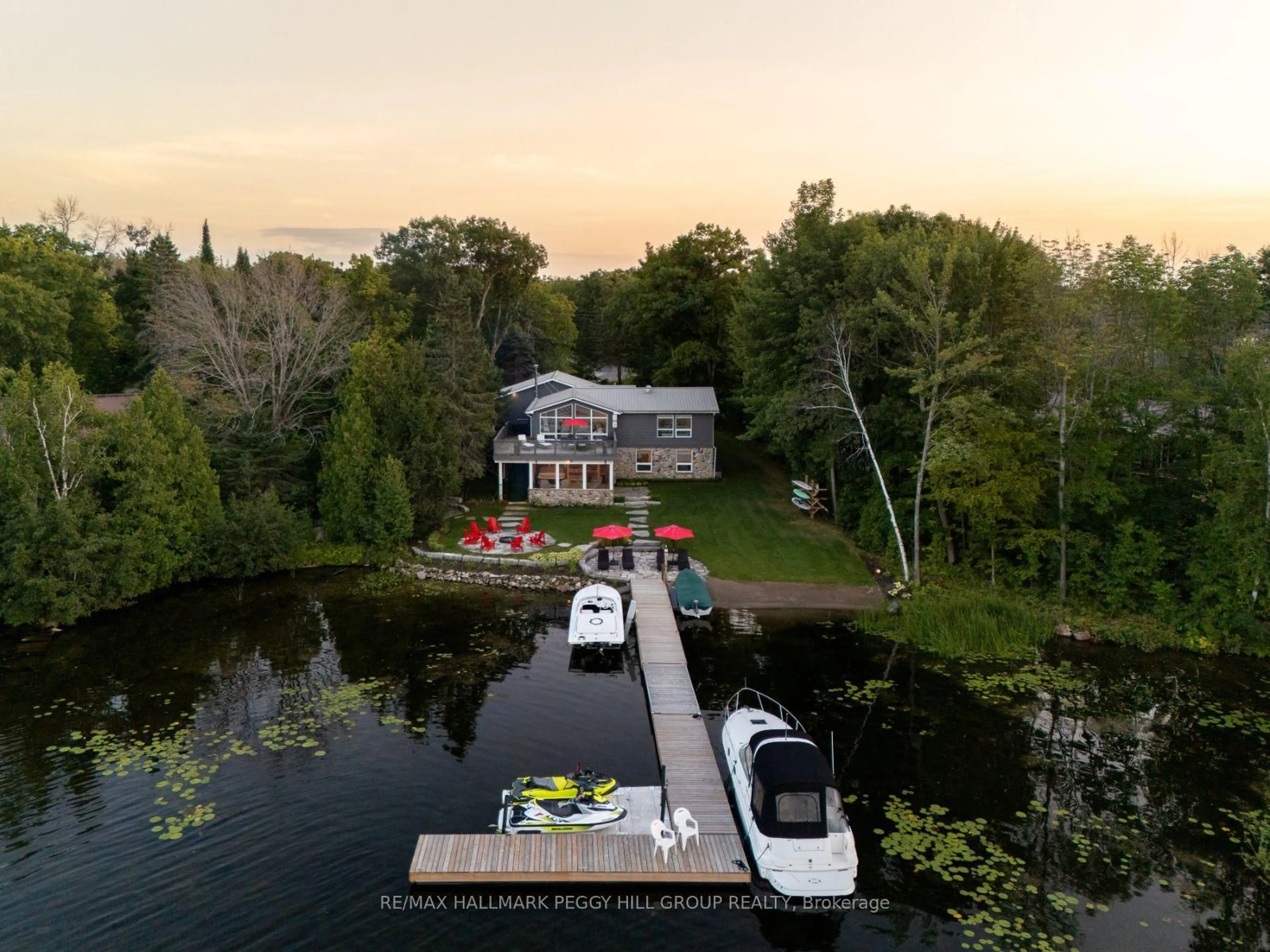 A pic from outside/outdoor area/front of a property/back of a property/a pic from drone, water/lake/river/ocean view for 3352 Russell Dr, Severn Ontario L0K 1S0