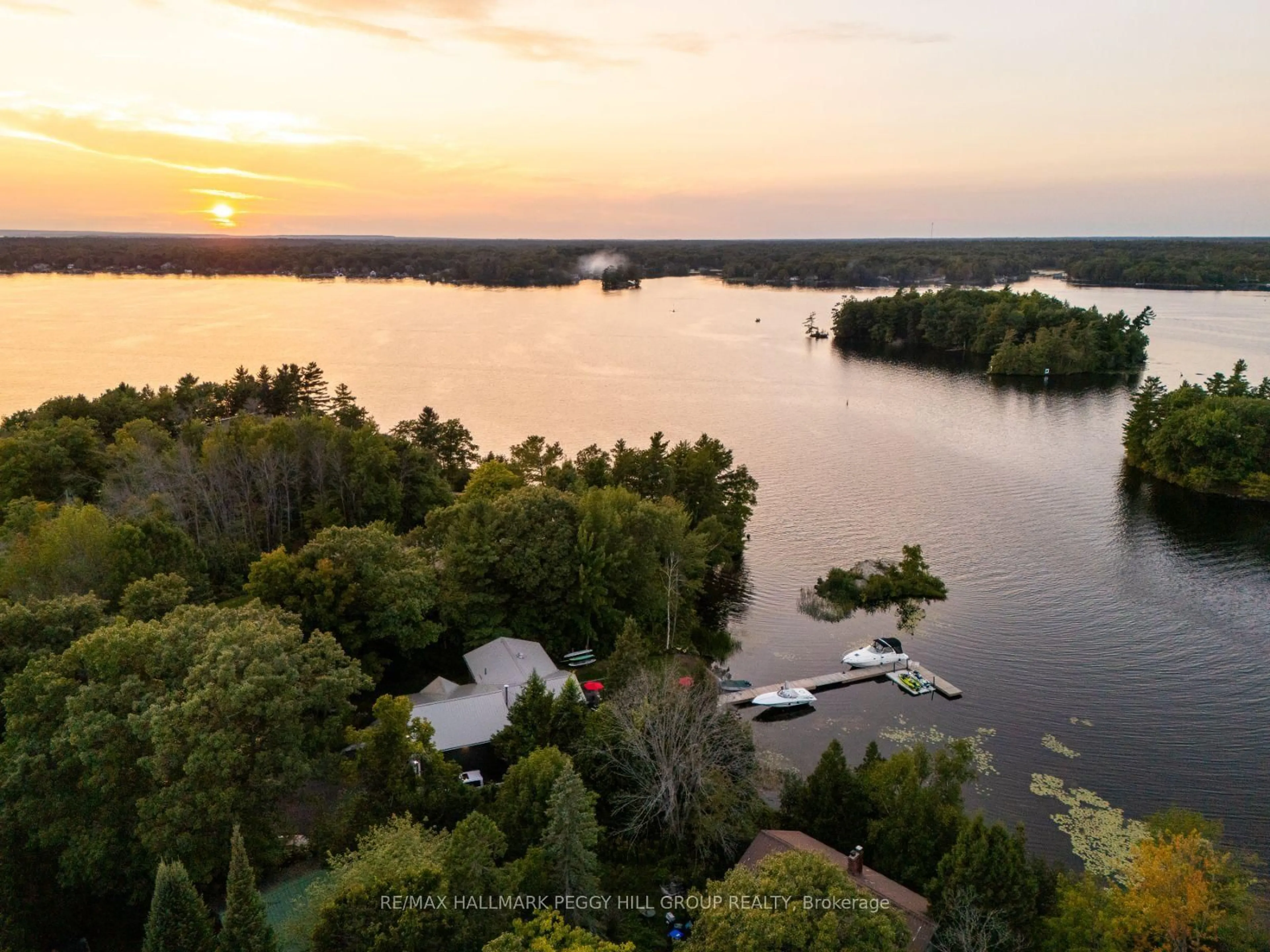 A pic from outside/outdoor area/front of a property/back of a property/a pic from drone, water/lake/river/ocean view for 3352 Russell Dr, Severn Ontario L0K 1S0