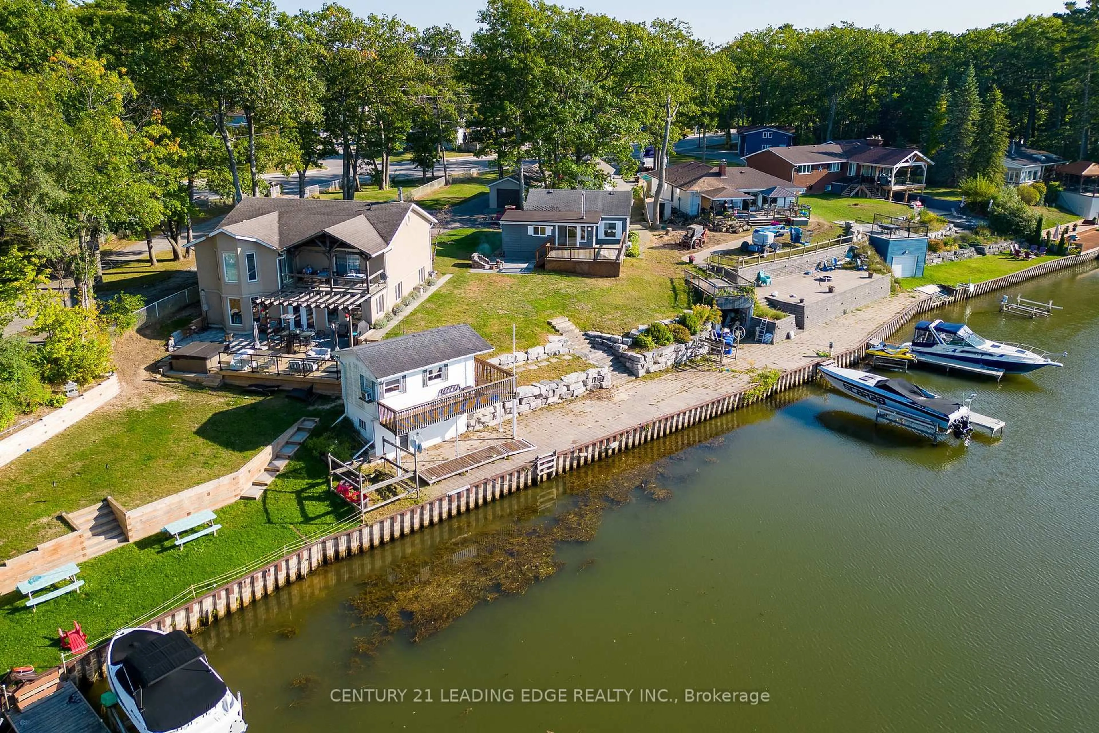 A pic from outside/outdoor area/front of a property/back of a property/a pic from drone, water/lake/river/ocean view for 1988 River Rd, Wasaga Beach Ontario L9Z 2W1