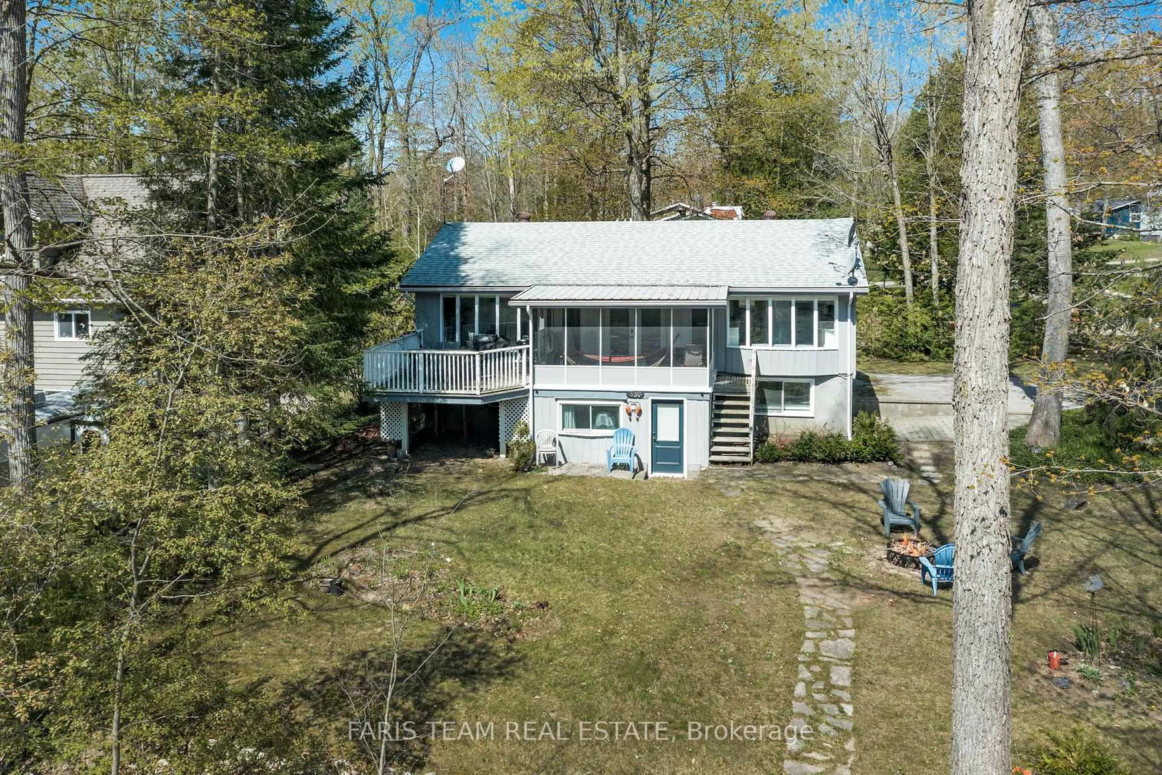A pic from outside/outdoor area/front of a property/back of a property/a pic from drone, water/lake/river/ocean view for 336 Peek-A-Boo Tr, Tiny Ontario L9M 0B3