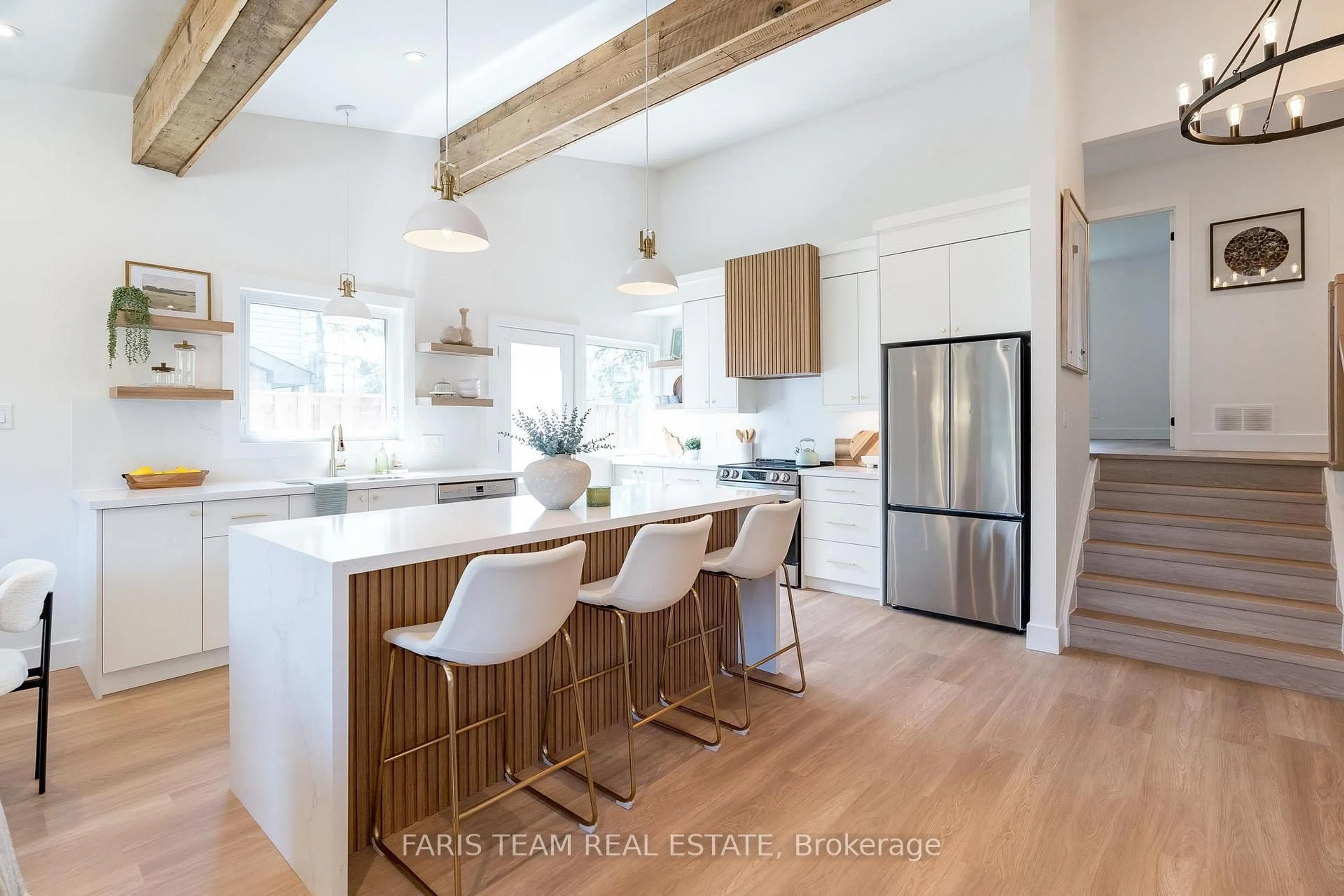 Open concept kitchen, wood/laminate floor for 12 Oren Blvd, Barrie Ontario L4N 4M1
