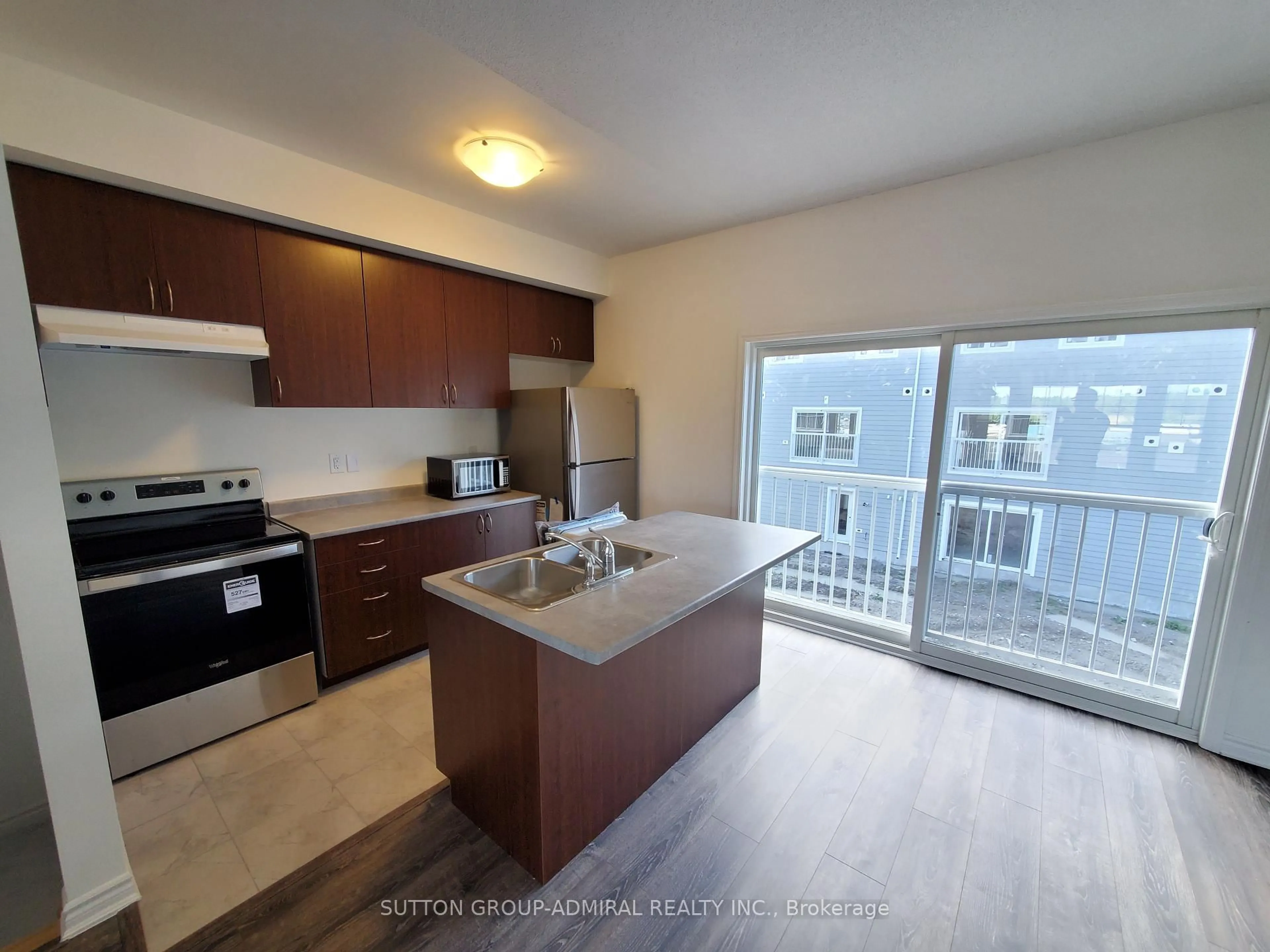 Open concept kitchen, unknown for 38 Surf Dr, Wasaga Beach Ontario L9Z 0J4