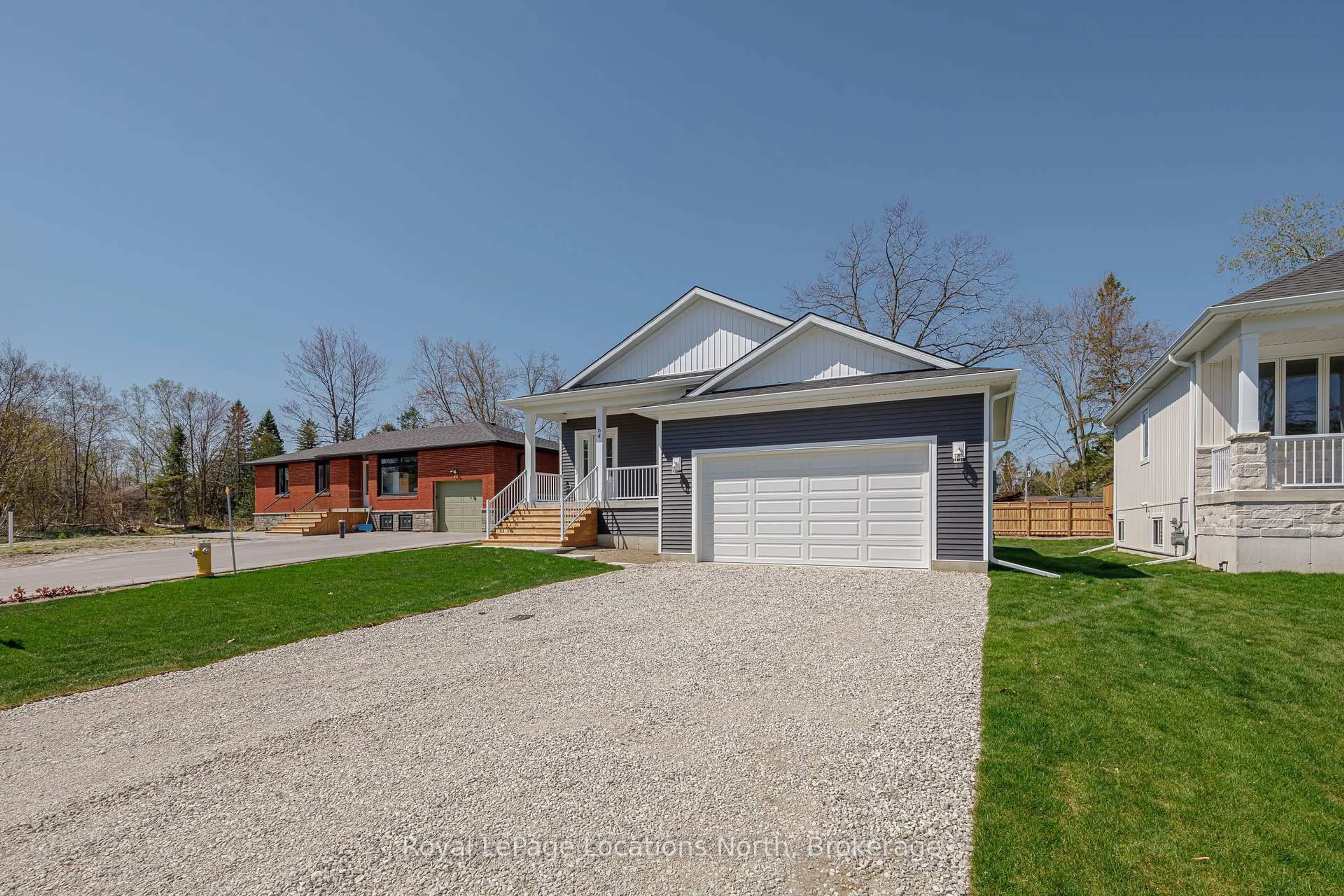 Home with brick exterior material, street for 64 52nd St, Wasaga Beach Ontario L9Z 1W8