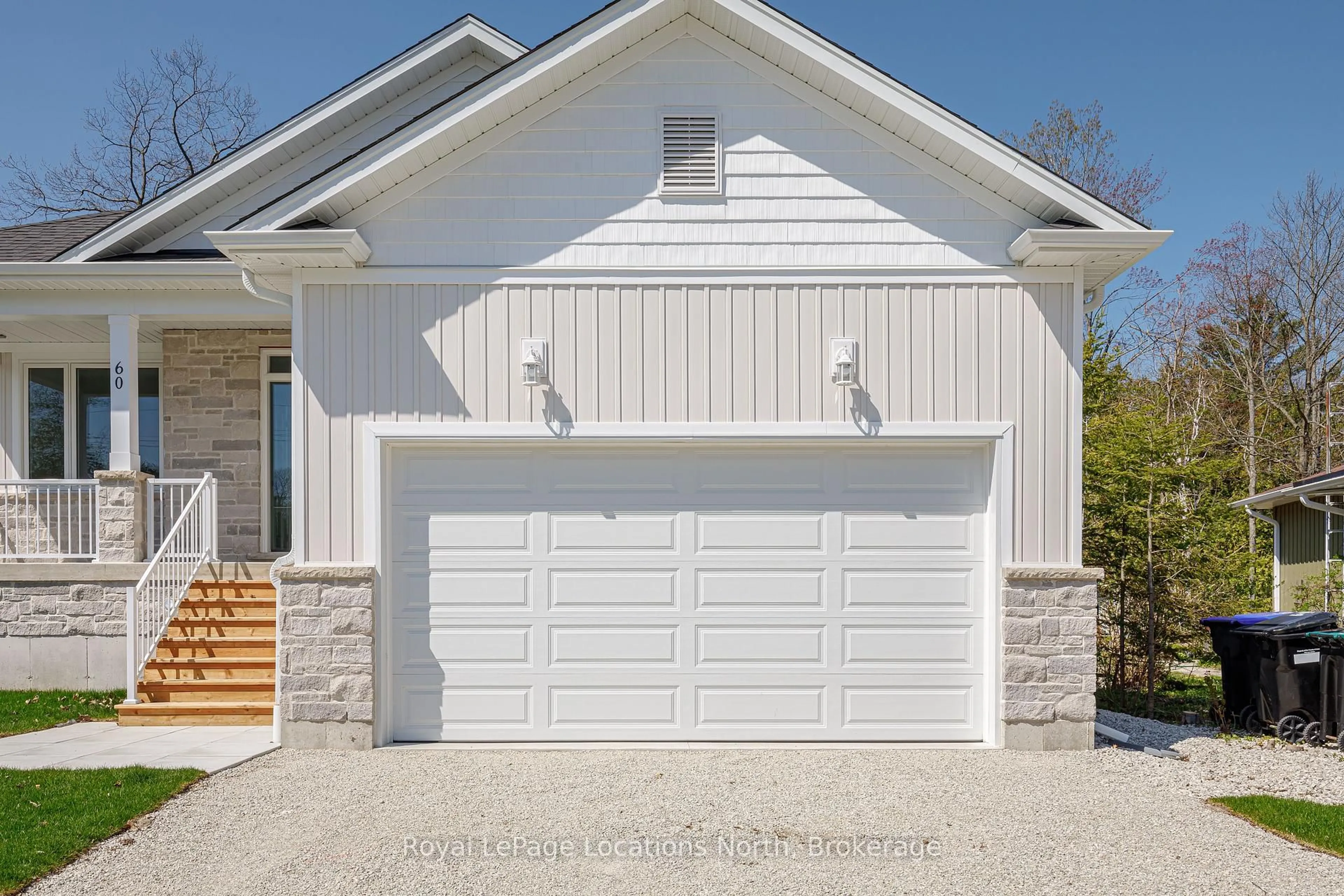 Home with vinyl exterior material, street for 60 52nd St, Wasaga Beach Ontario L0M 1P0