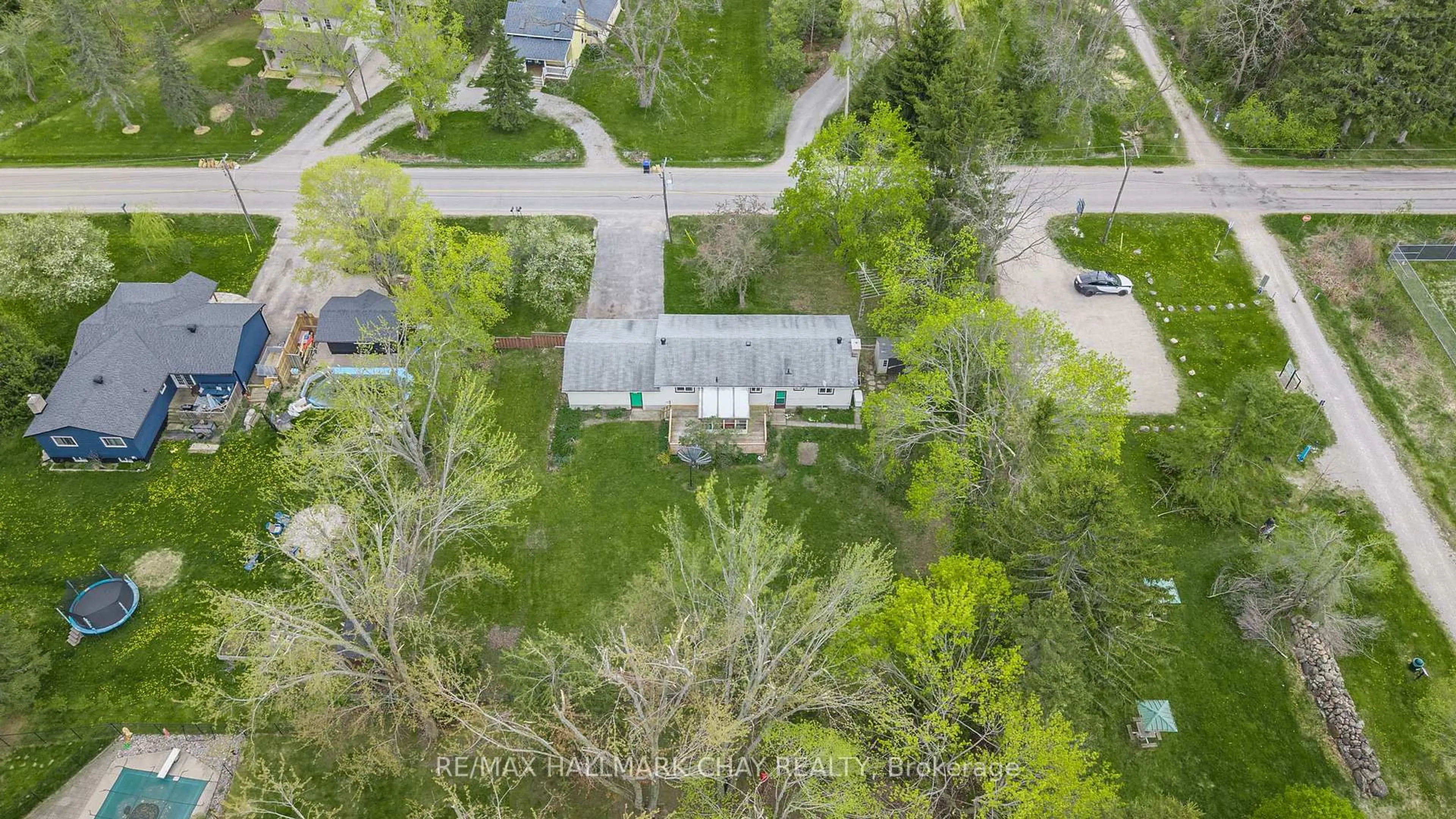 A pic from outside/outdoor area/front of a property/back of a property/a pic from drone, street for 1071 Line 2 S N/A, Oro-Medonte Ontario L0L 2L0