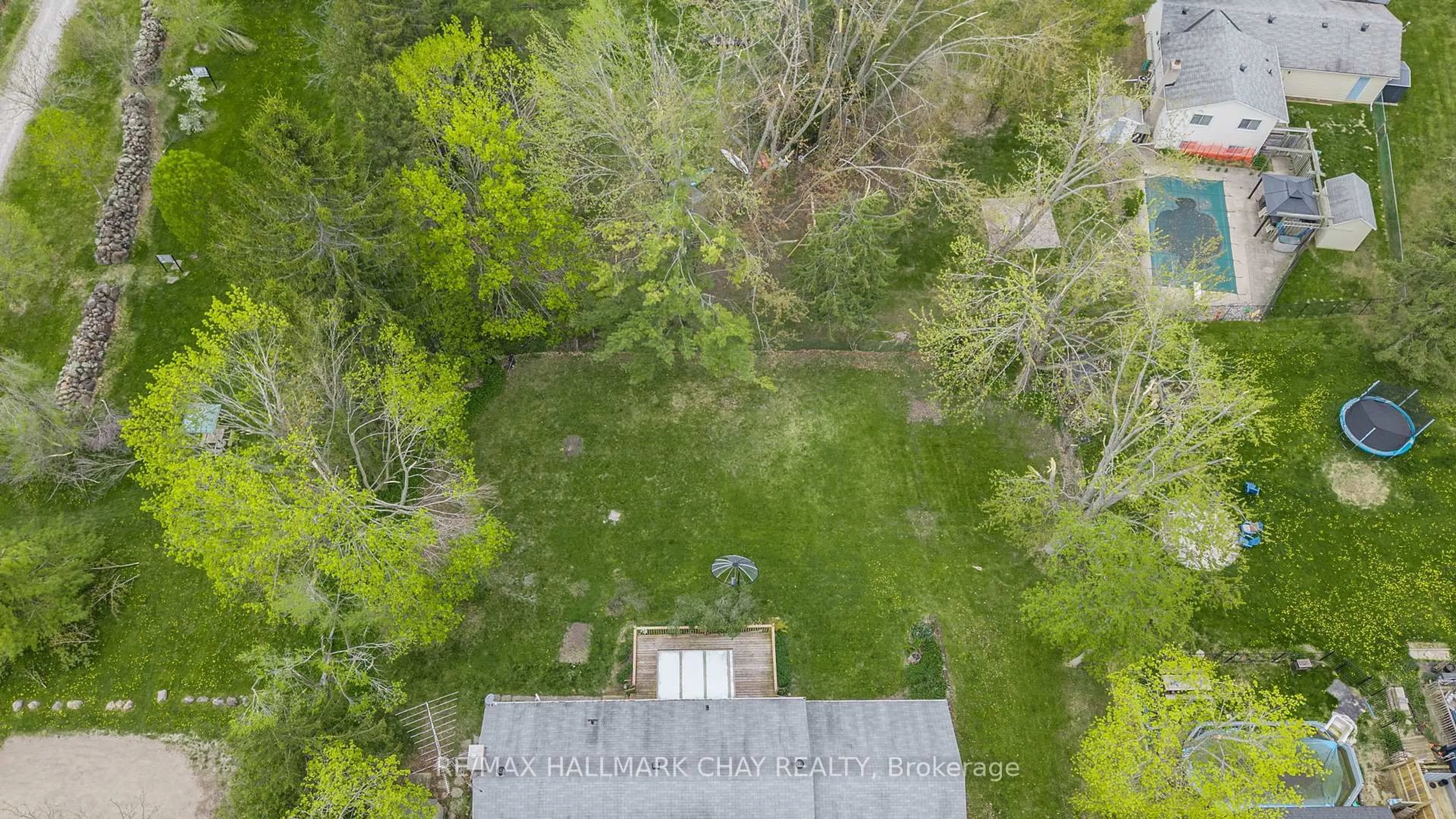 A pic from outside/outdoor area/front of a property/back of a property/a pic from drone, forest/trees view for 1071 Line 2 S N/A, Oro-Medonte Ontario L0L 2L0