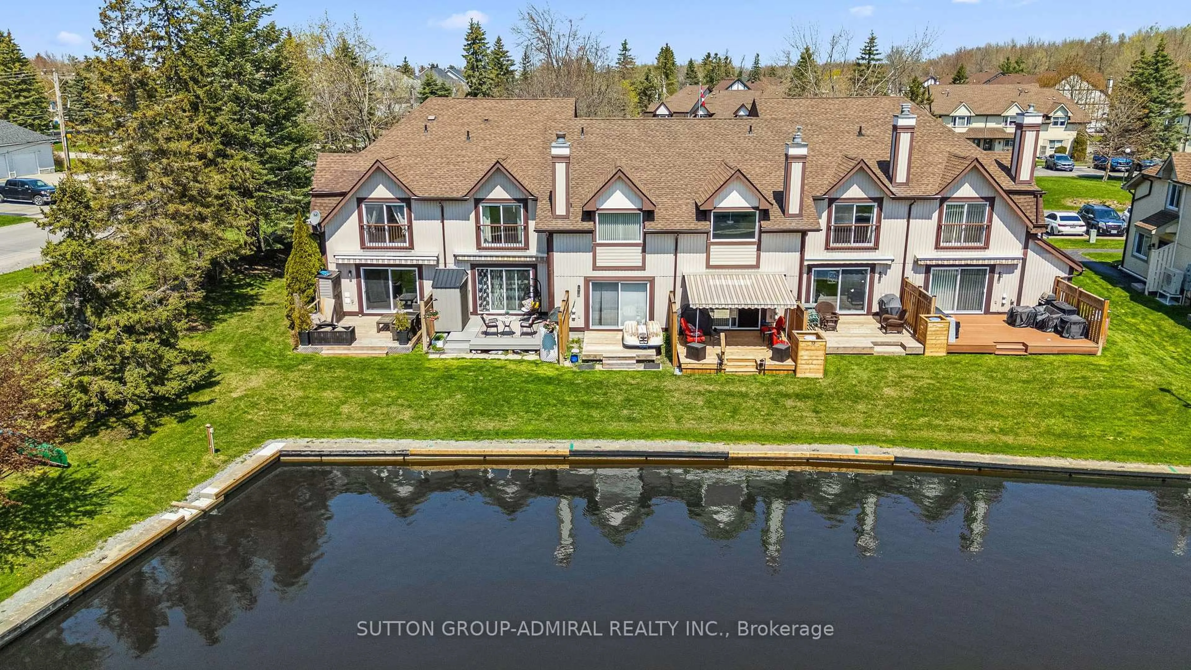 A pic from outside/outdoor area/front of a property/back of a property/a pic from drone, water/lake/river/ocean view for 21 Laguna Pkwy #35, Ramara Ontario L0K 1B0