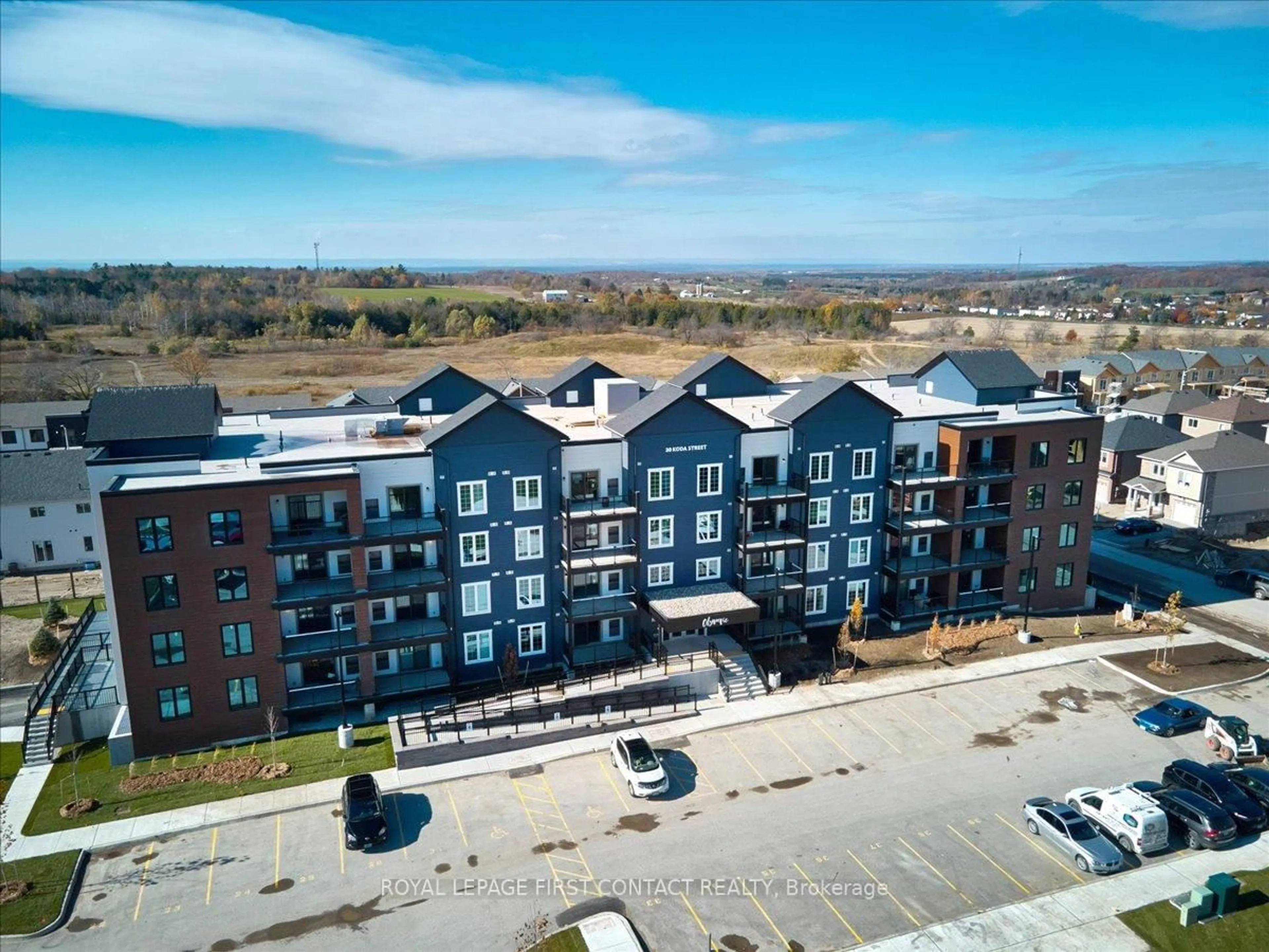 A pic from outside/outdoor area/front of a property/back of a property/a pic from drone, building for 20 Koda St #410, Barrie Ontario L9J 0J7