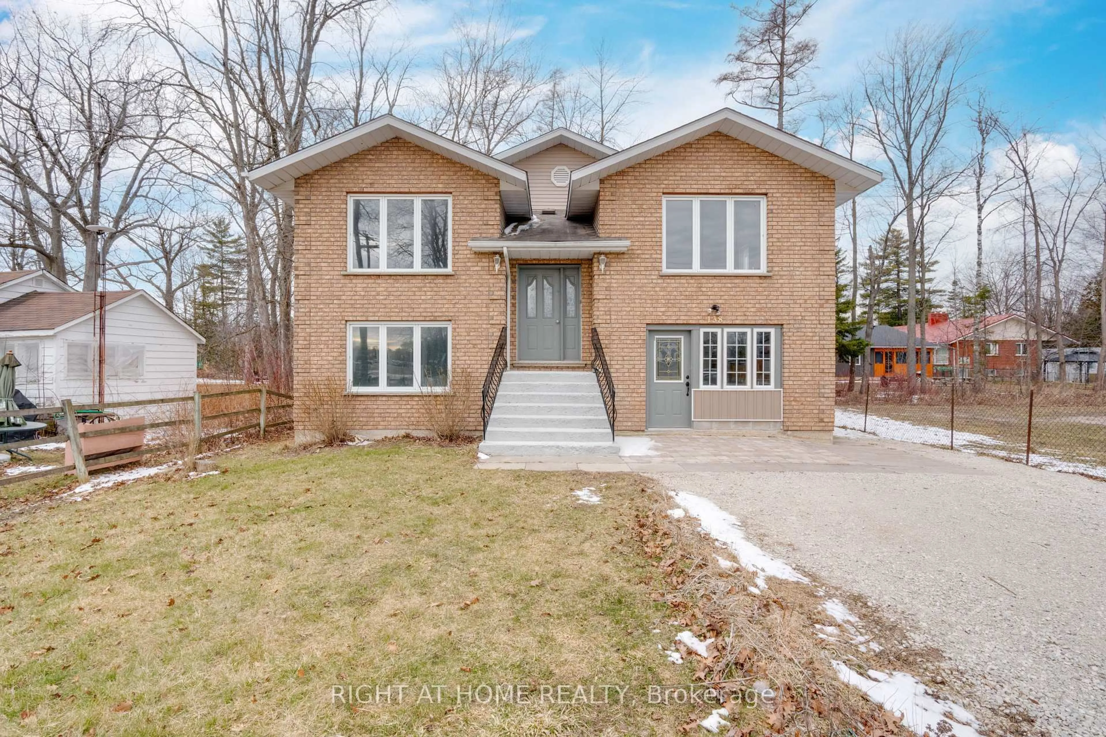 Home with brick exterior material, street for 138 45th St, Wasaga Beach Ontario L9Z 1Z2