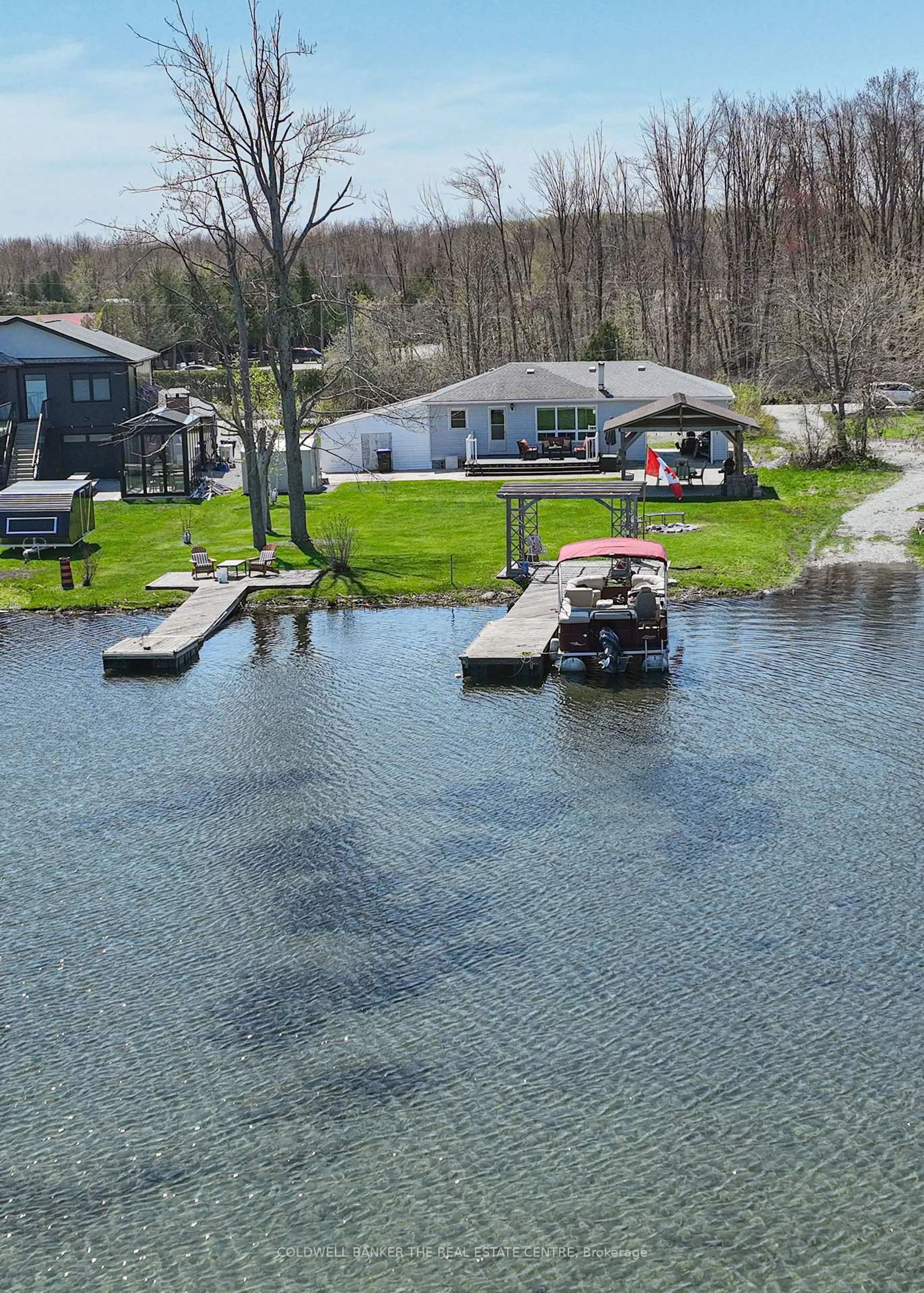 A pic from outside/outdoor area/front of a property/back of a property/a pic from drone, water/lake/river/ocean view for 4137 Bayview Ave, Ramara Ontario L3V 6H7