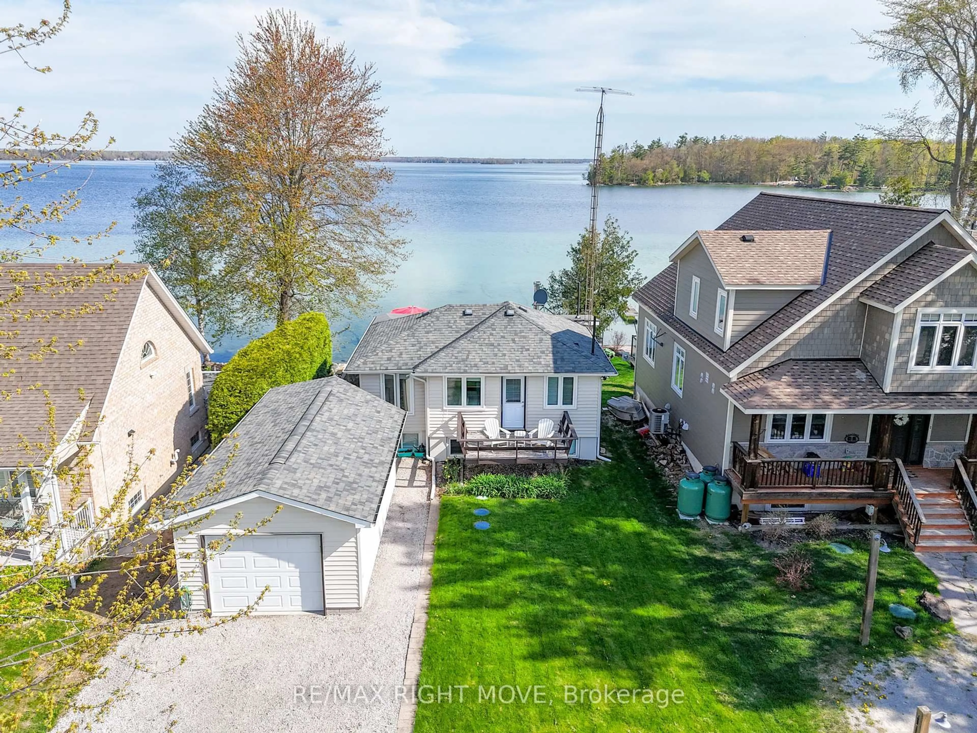 A pic from outside/outdoor area/front of a property/back of a property/a pic from drone, water/lake/river/ocean view for 3752 Portage Bay Rd, Ramara Ontario L0K 2B0