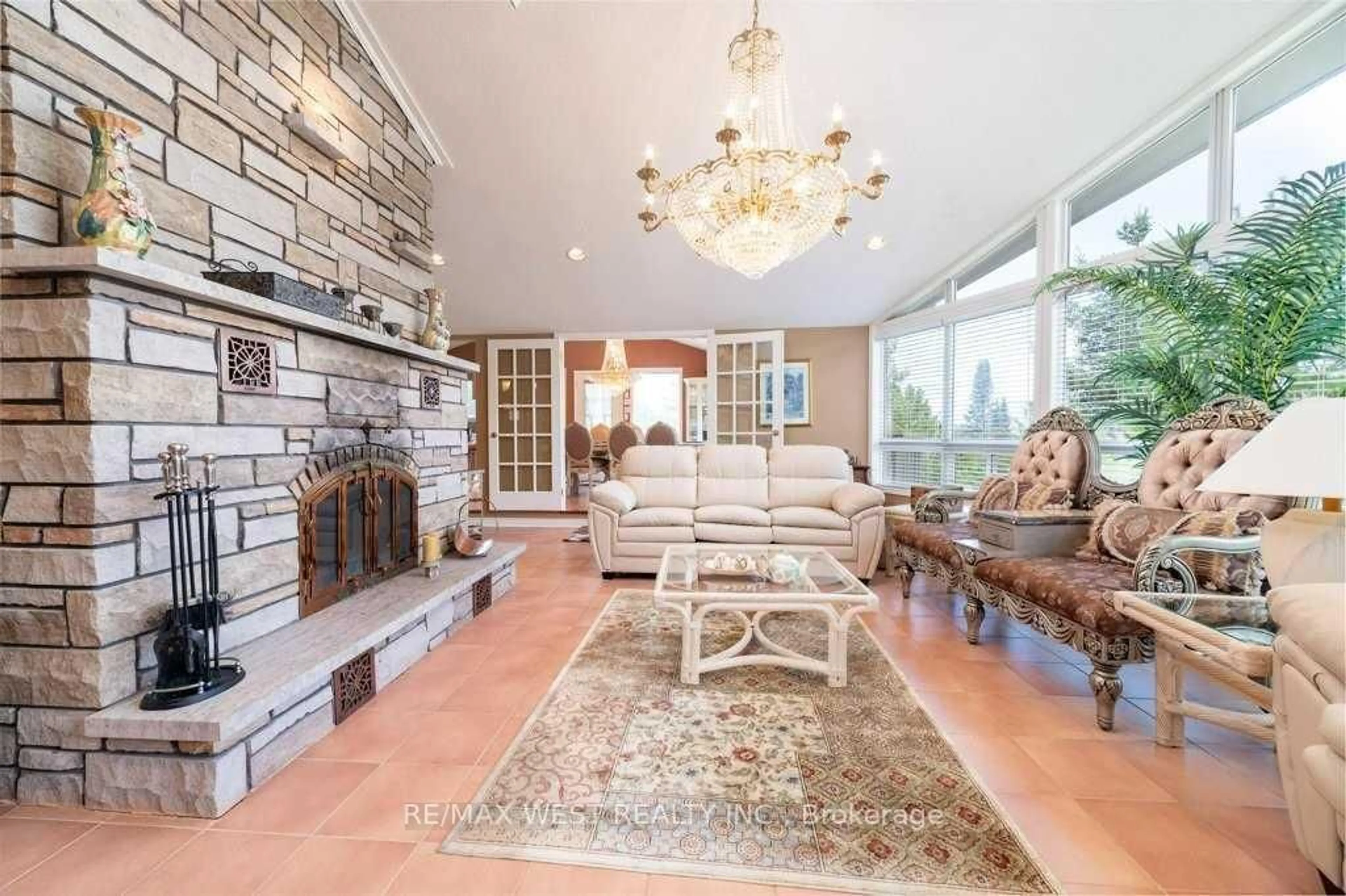 Living room with furniture, ceramic/tile floor for 29 Milton St, Tiny Ontario L0L 2T0