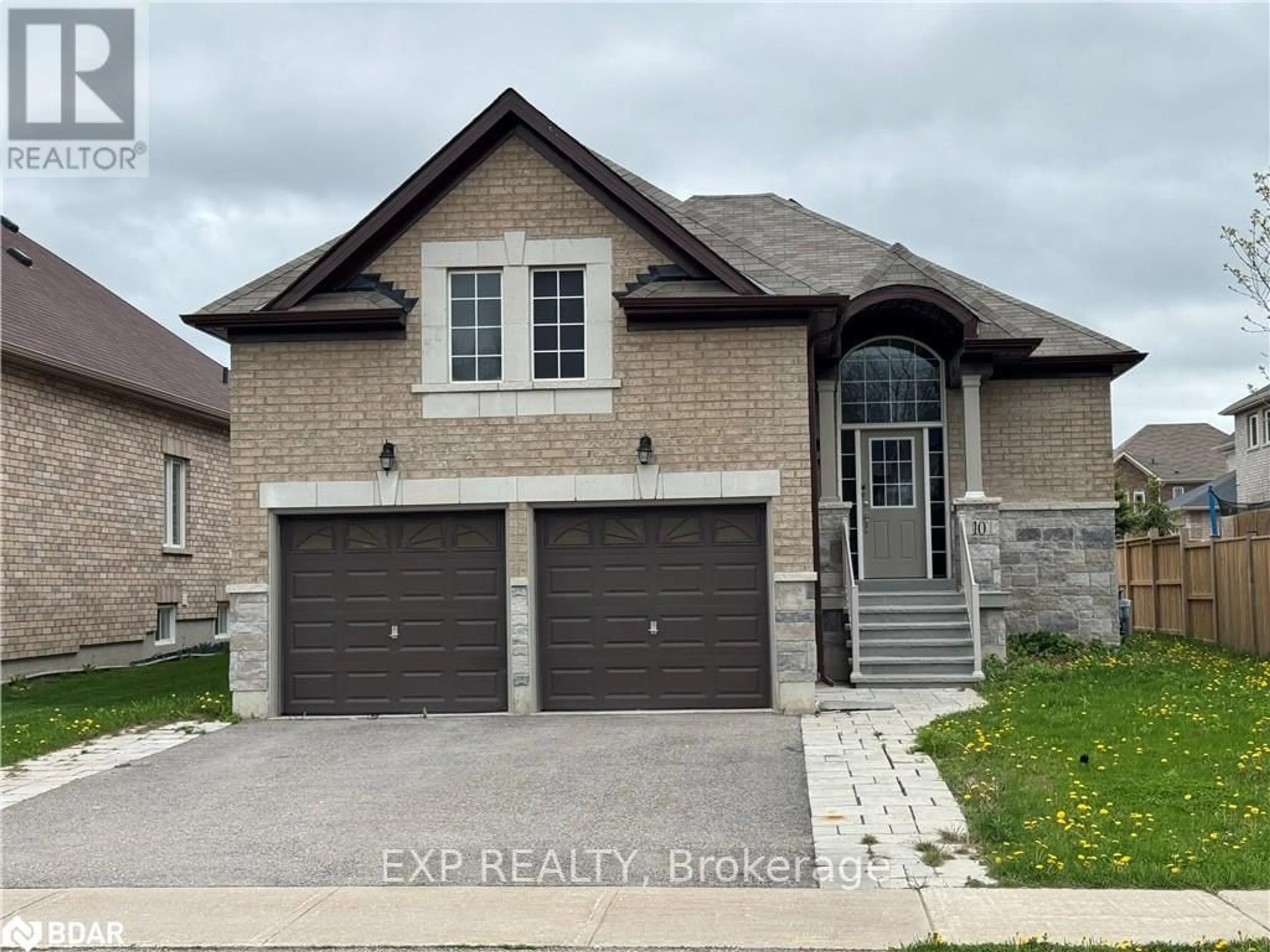 Home with brick exterior material, street for 10 Falvo St, Wasaga Beach Ontario L9Z 0G8