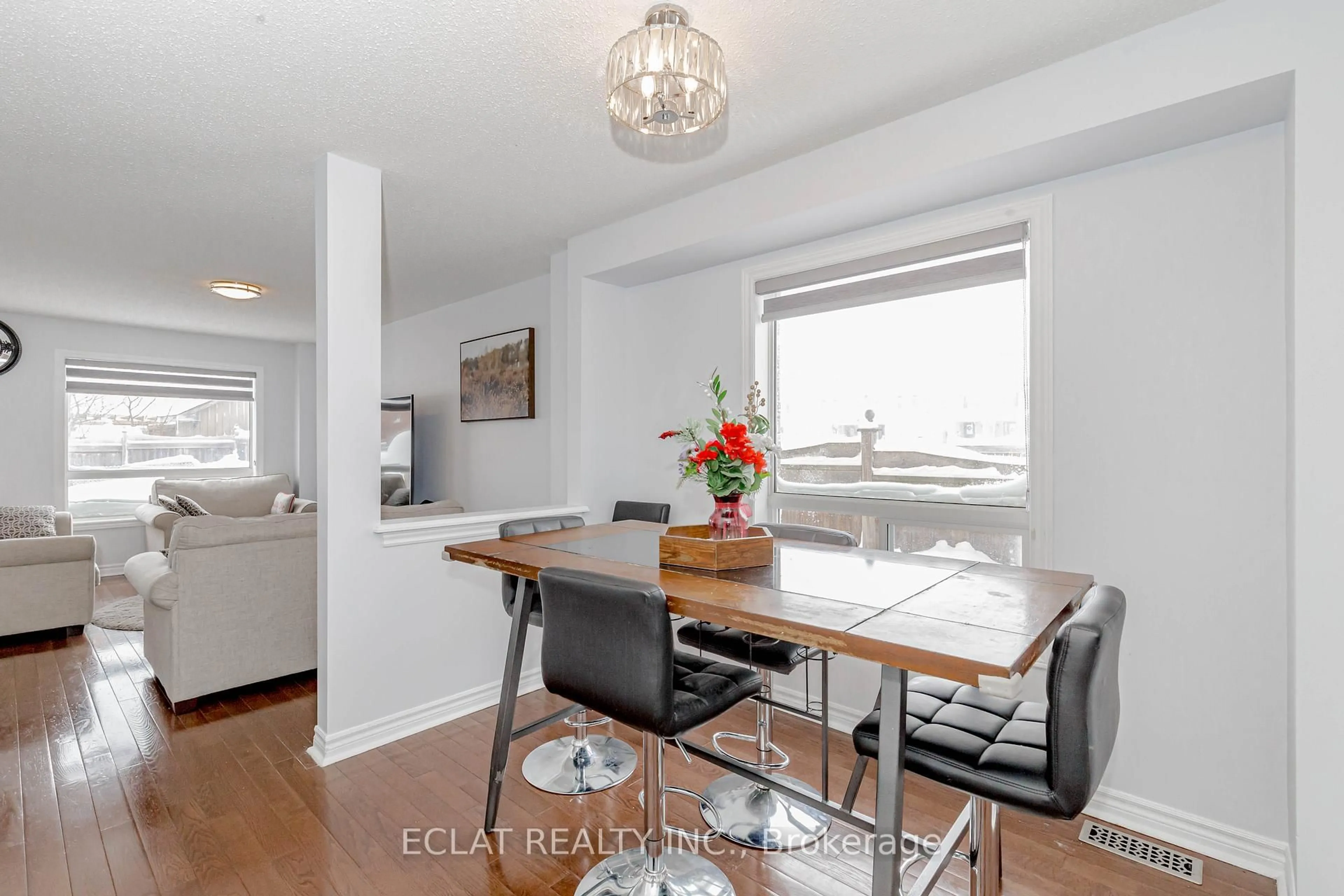 Open concept kitchen, wood/laminate floor for 12 Lancaster Crt, Barrie Ontario L4M 0G1
