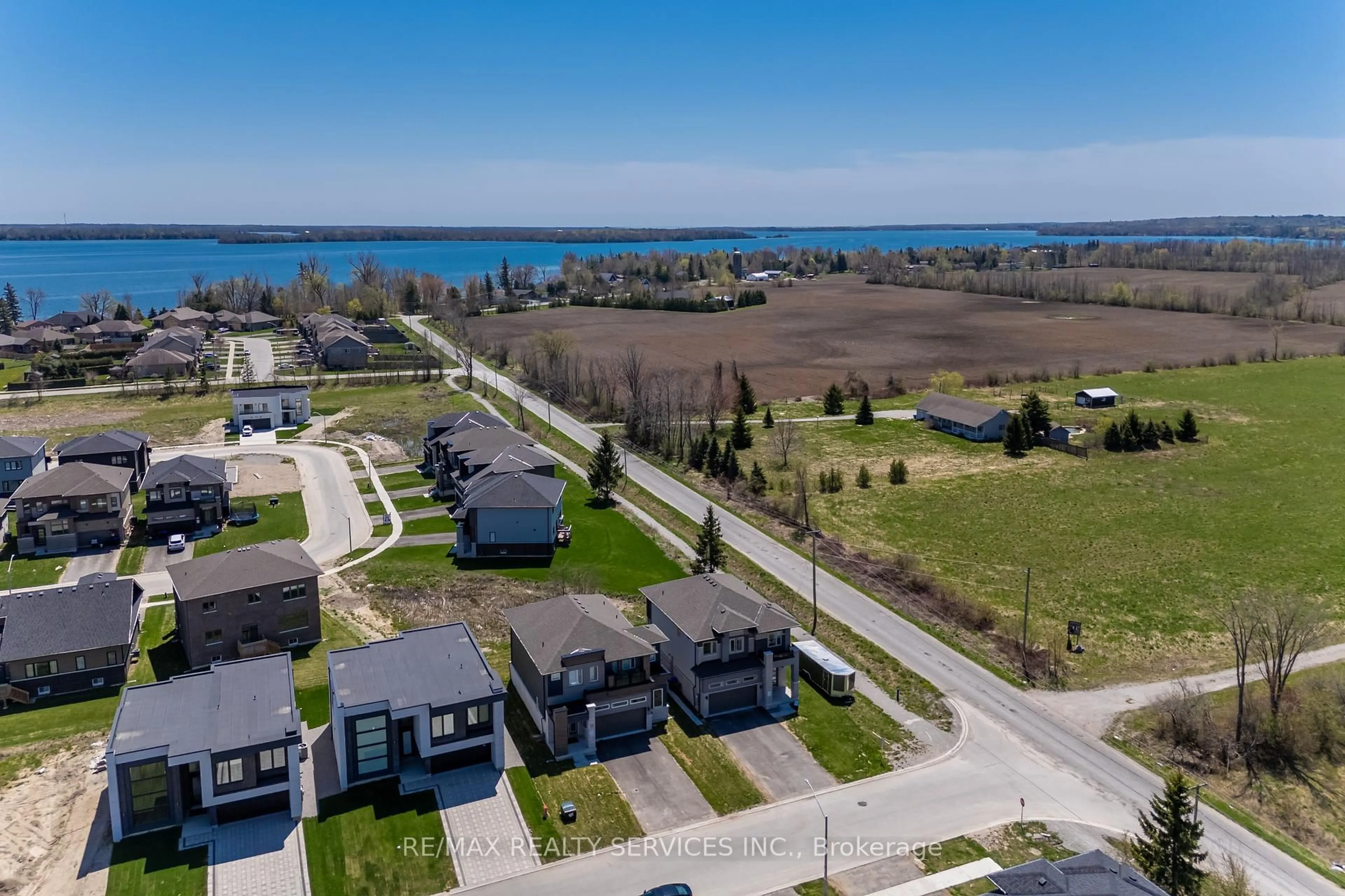 A pic from outside/outdoor area/front of a property/back of a property/a pic from drone, water/lake/river/ocean view for 3700 Quayside Dr, Severn Ontario L3V 6H3