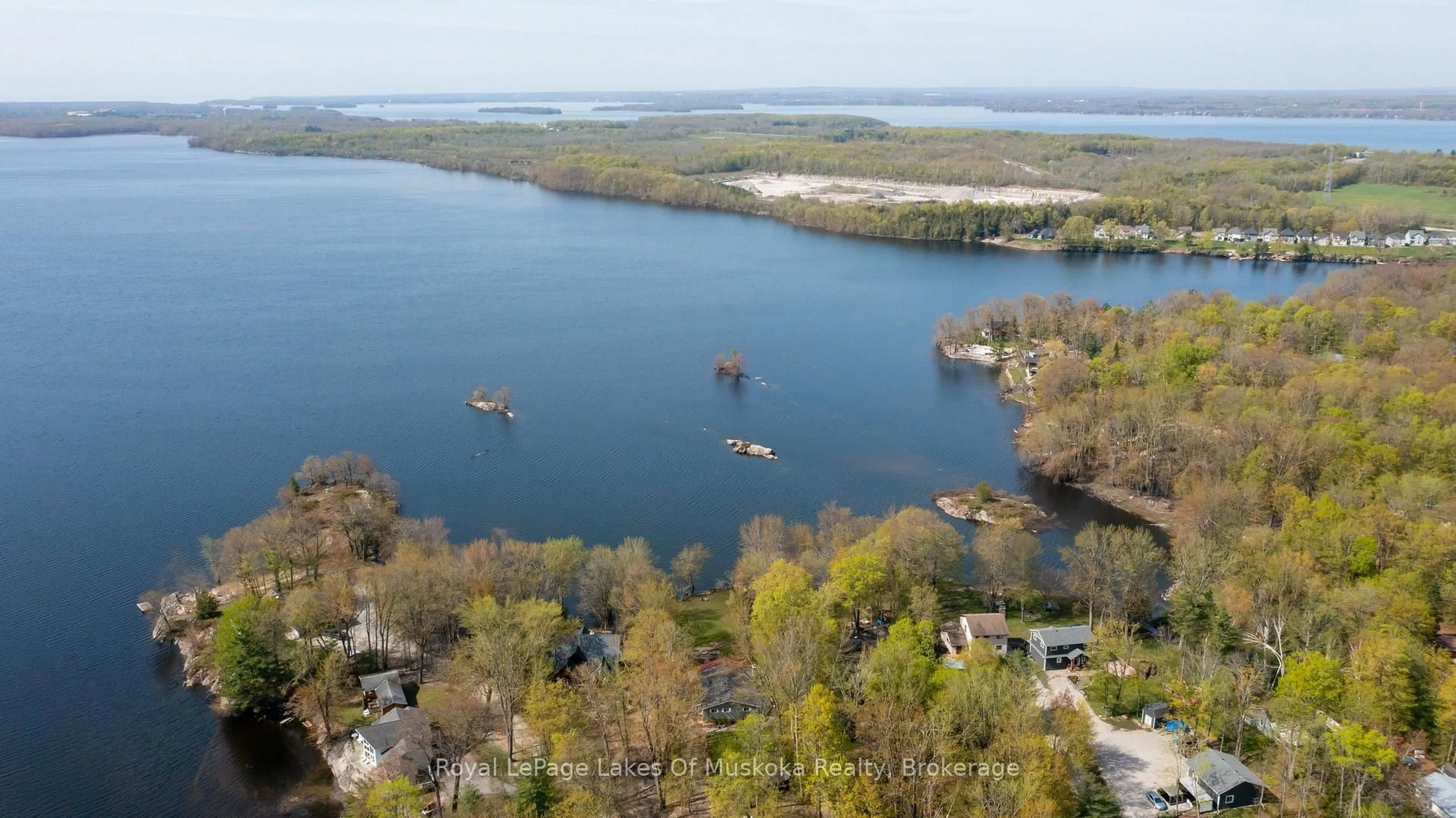A pic from outside/outdoor area/front of a property/back of a property/a pic from drone, water/lake/river/ocean view for 3445 Southwood Beach Blvd, Ramara Ontario L0K 2B0