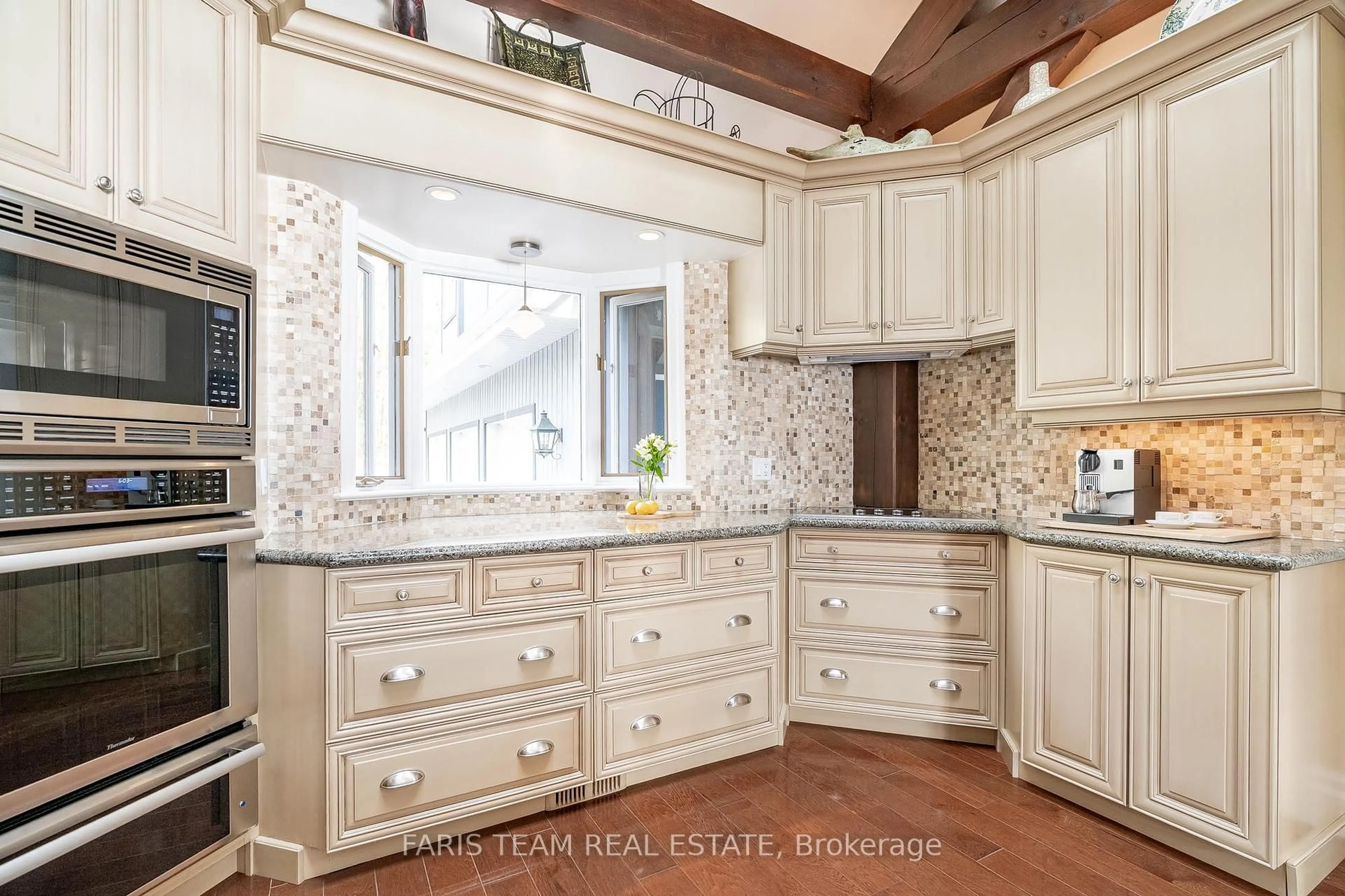 Open concept kitchen, ceramic/tile floor for 230 Melissa Lane, Tiny Ontario L9M 0K9
