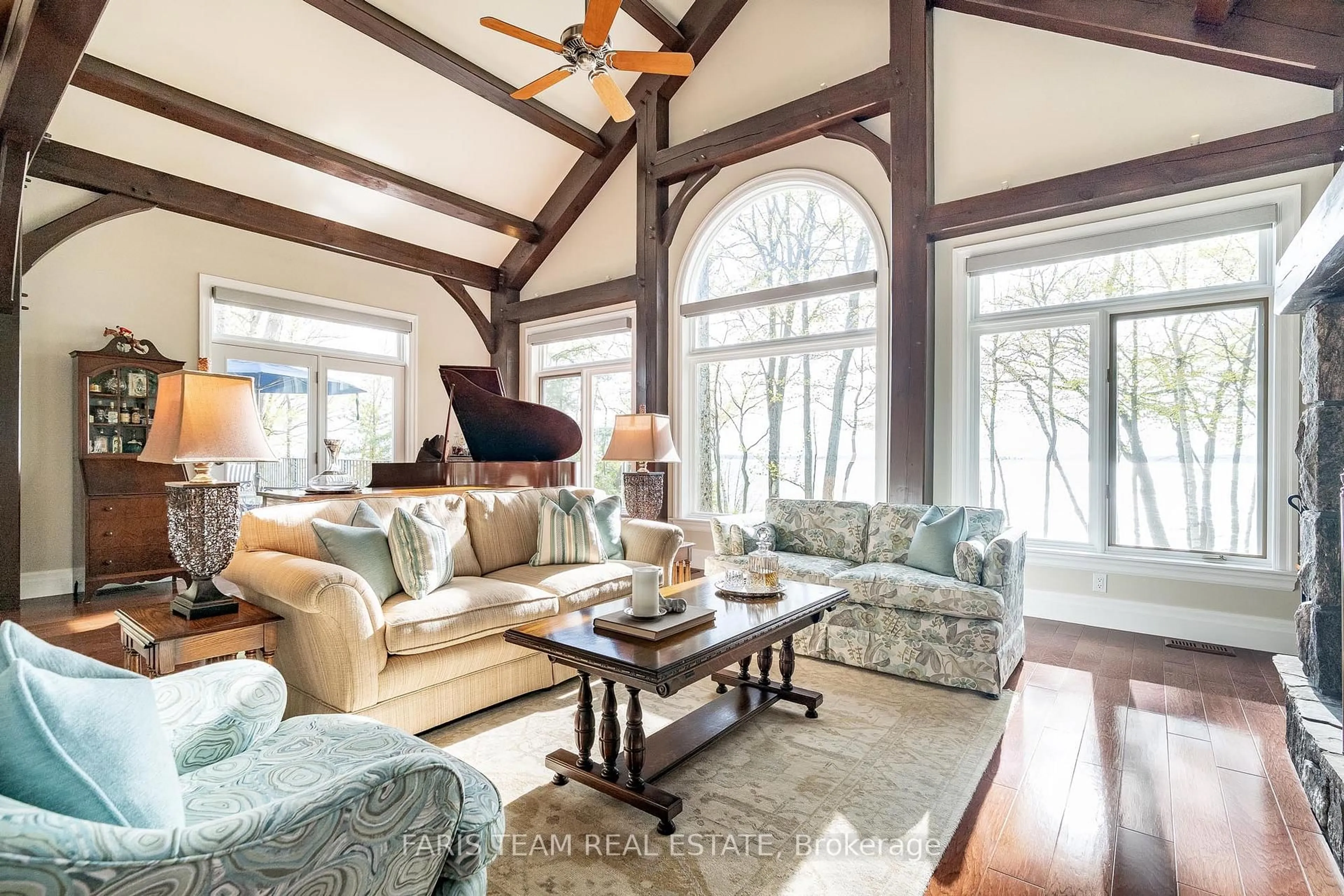 Living room with furniture, wood/laminate floor for 230 Melissa Lane, Tiny Ontario L9M 0K9