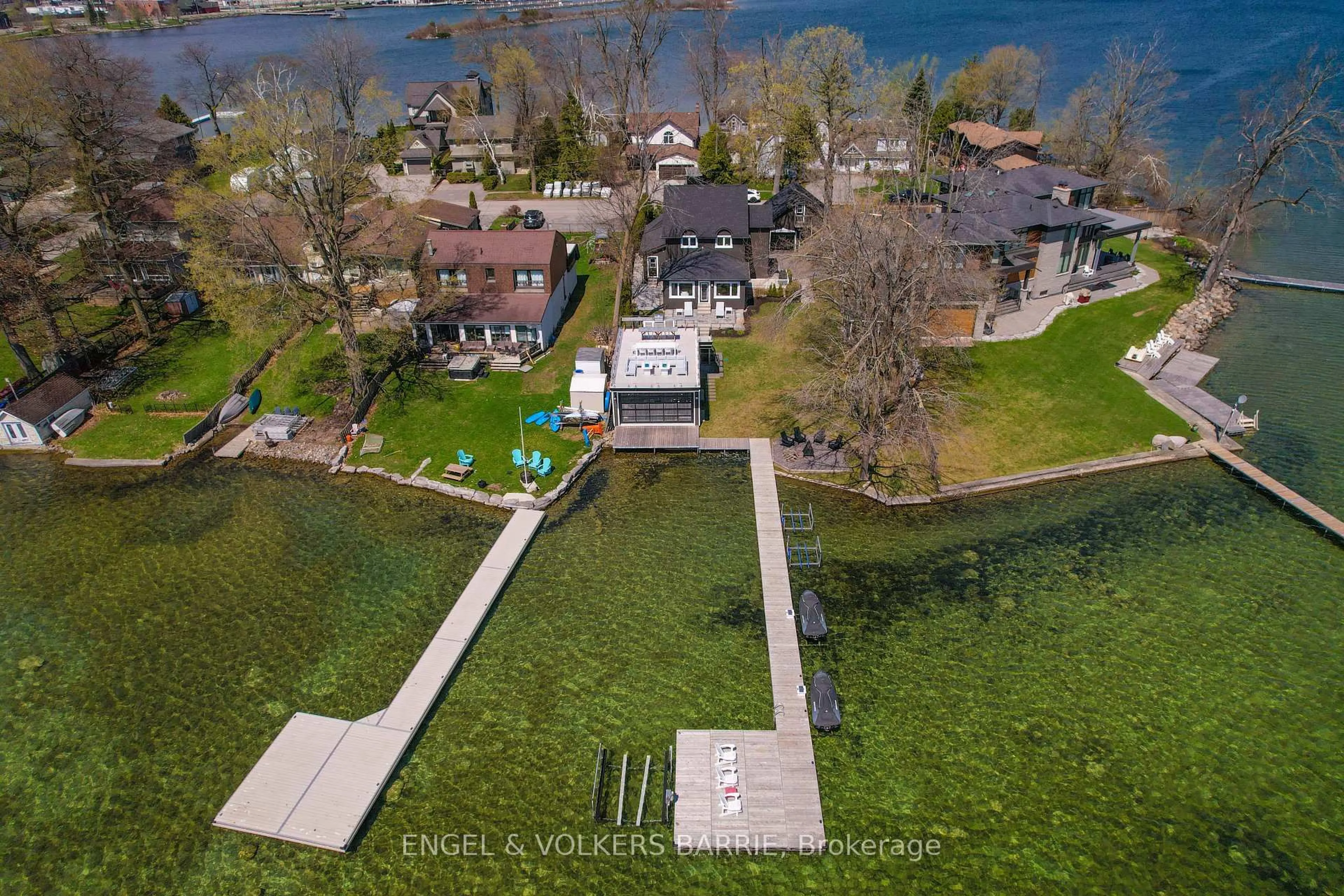 A pic from outside/outdoor area/front of a property/back of a property/a pic from drone, water/lake/river/ocean view for 201 Cedar Island Rd, Orillia Ontario L3V 1T2