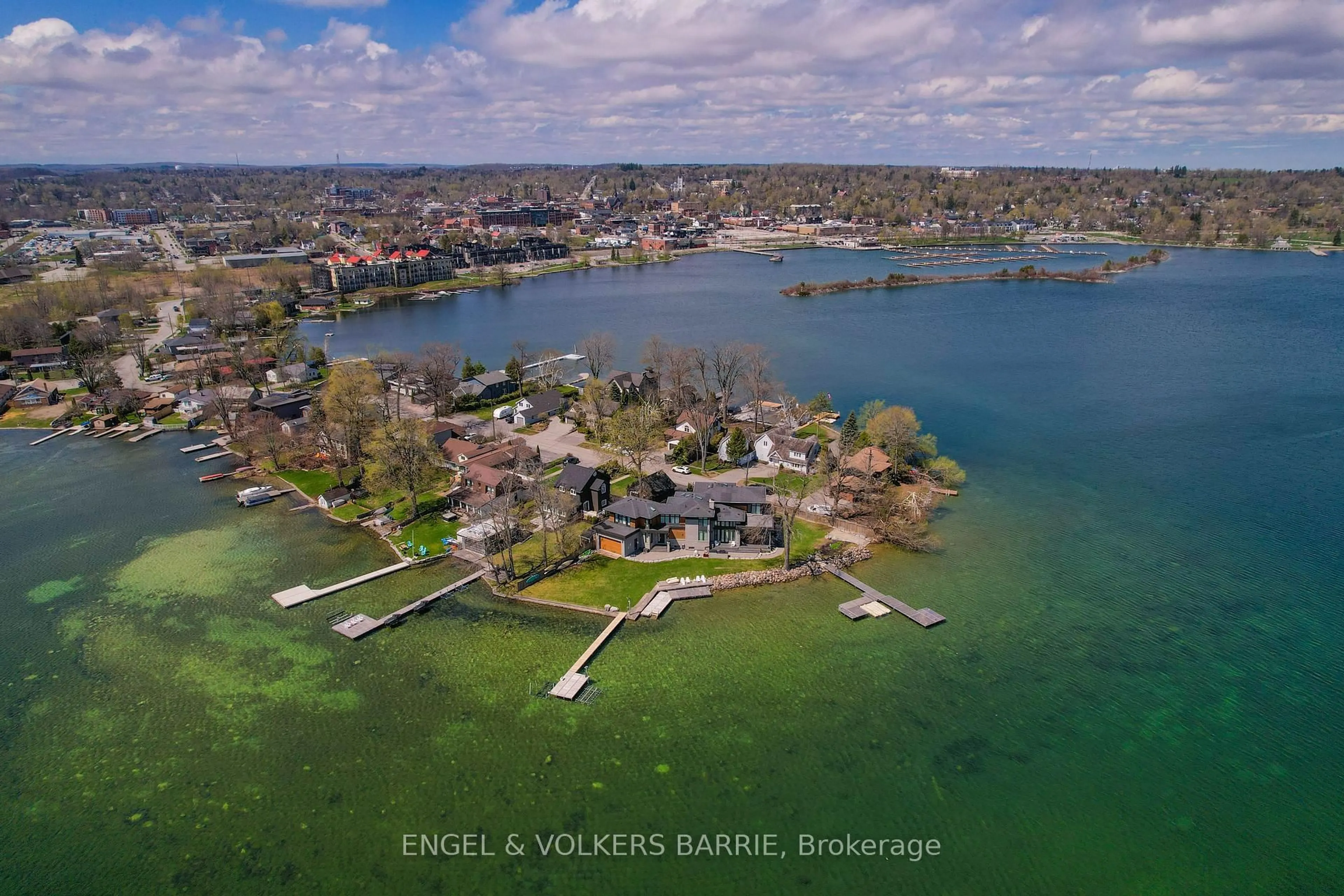 A pic from outside/outdoor area/front of a property/back of a property/a pic from drone, water/lake/river/ocean view for 201 Cedar Island Rd, Orillia Ontario L3V 1T2