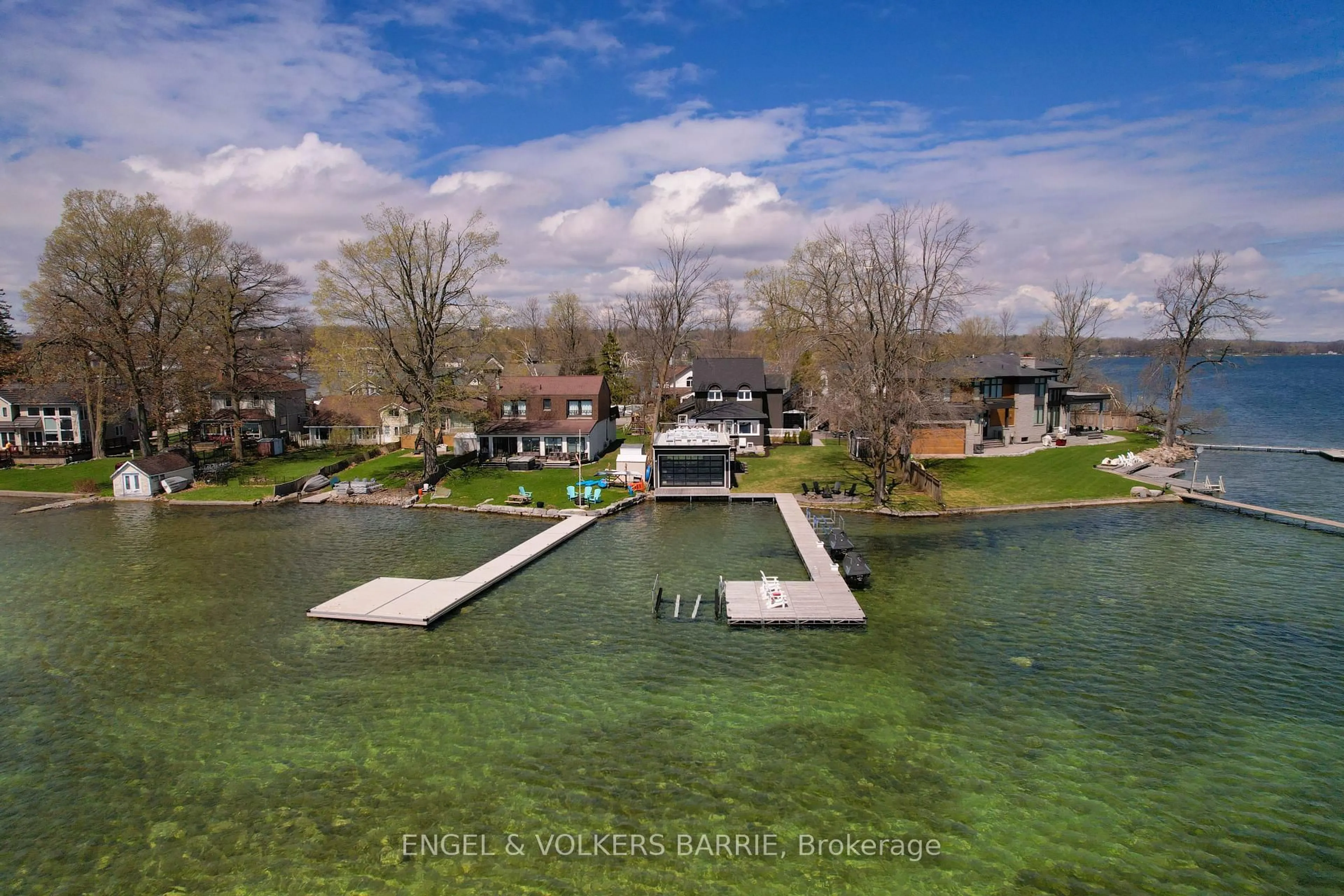 A pic from outside/outdoor area/front of a property/back of a property/a pic from drone, water/lake/river/ocean view for 201 Cedar Island Rd, Orillia Ontario L3V 1T2