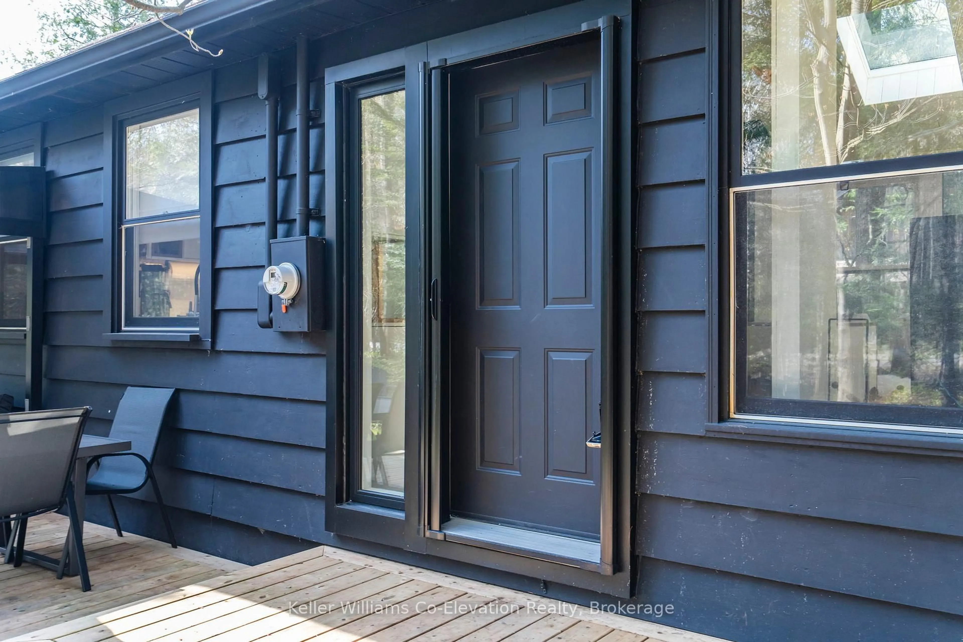 Home with vinyl exterior material, street for 1 Sundown Rd, Tiny Ontario L0L 2J0