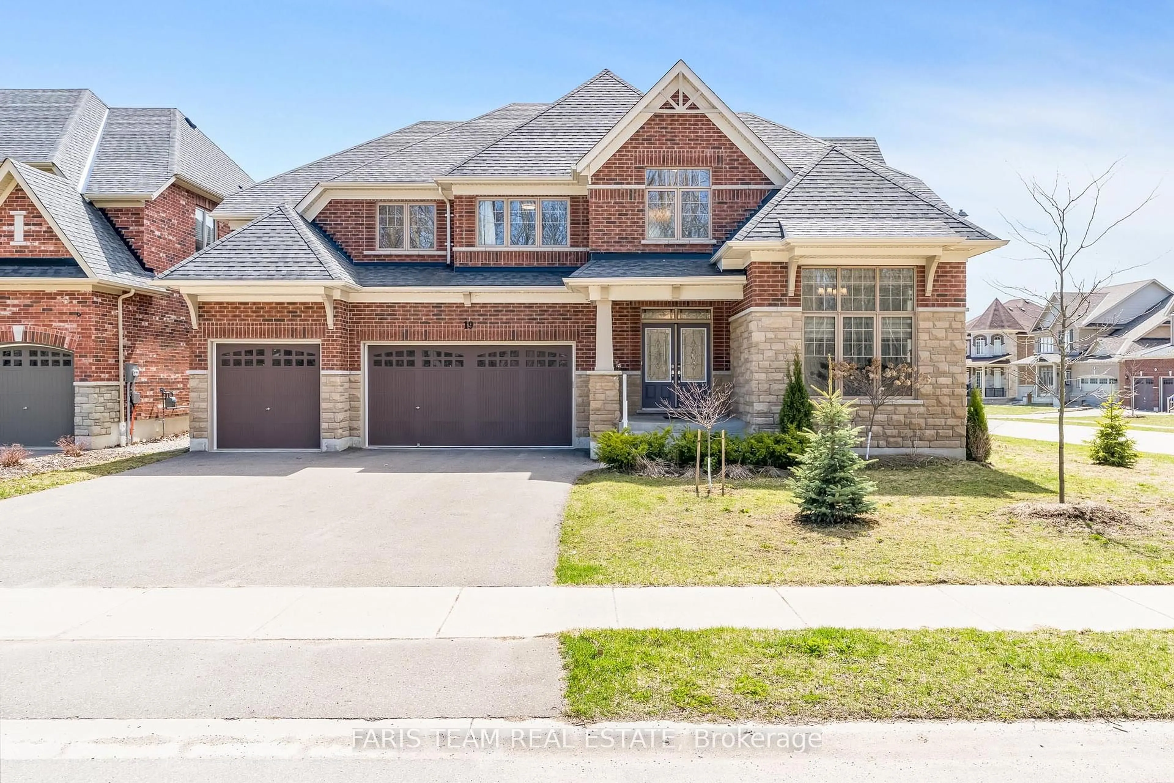 Home with brick exterior material, street for 19 McIsaac Dr, Springwater Ontario L9X 2A2