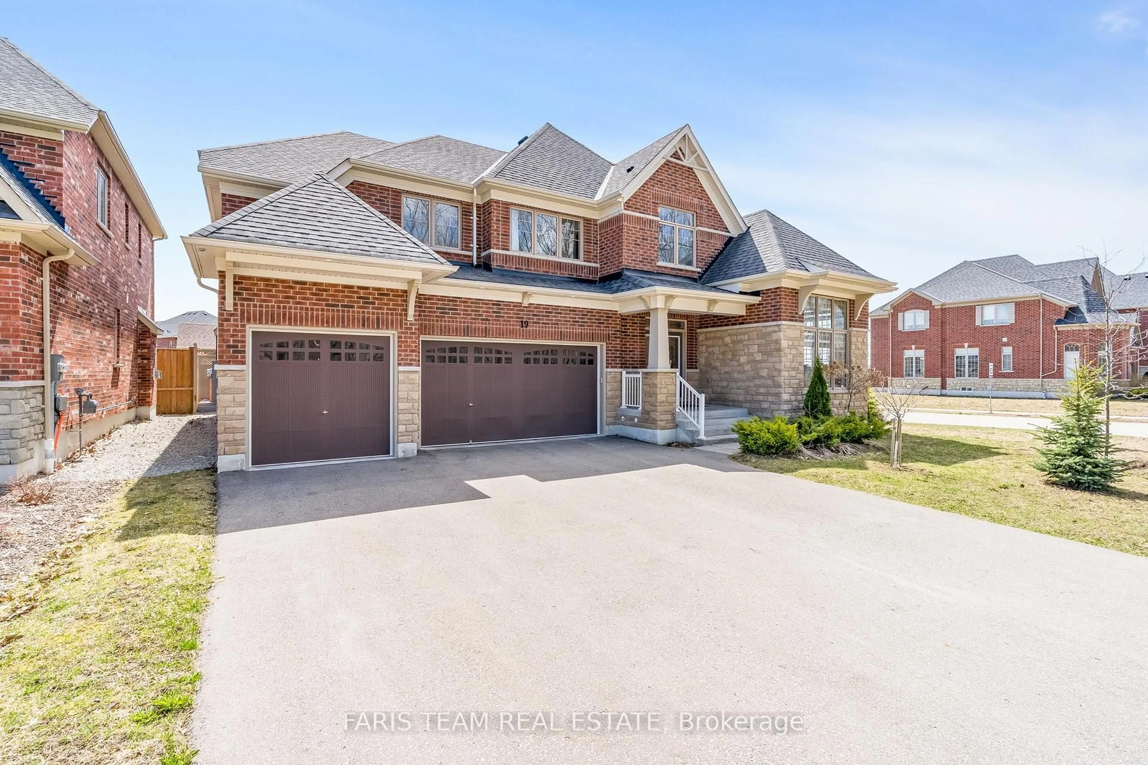 Home with brick exterior material, street for 19 McIsaac Dr, Springwater Ontario L9X 2A2