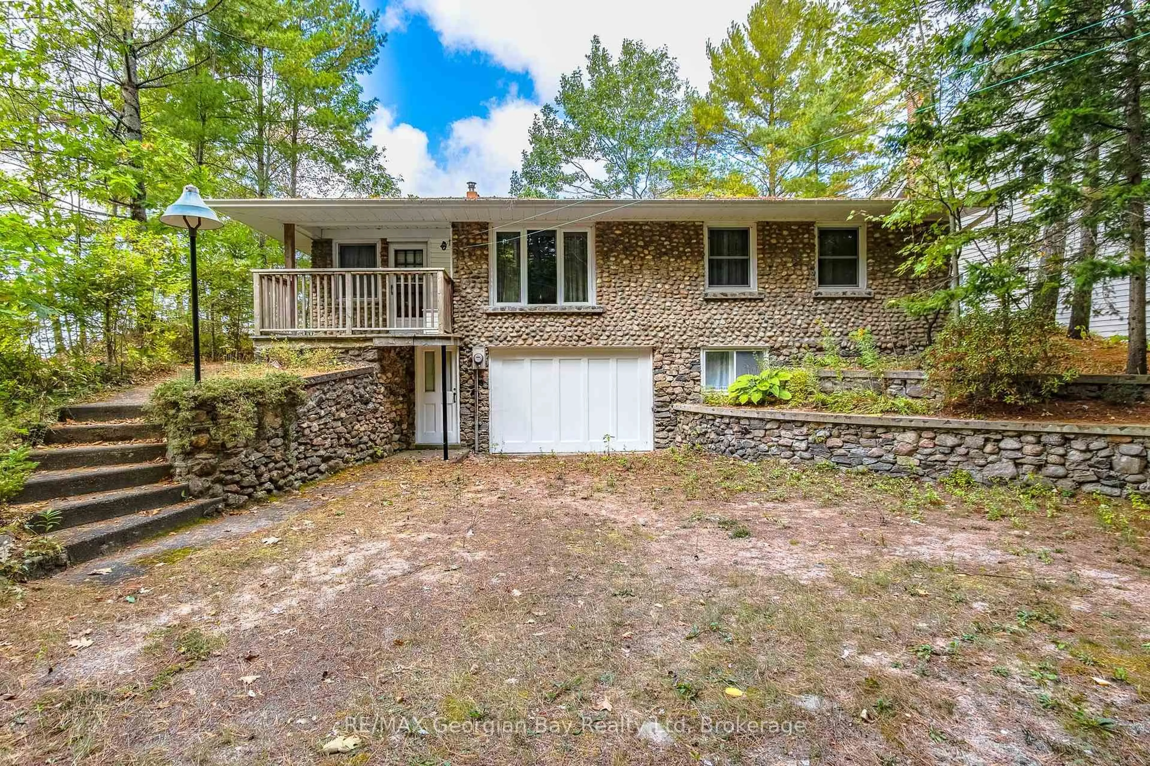 A pic from outside/outdoor area/front of a property/back of a property/a pic from drone, unknown for 750 Tiny Beaches Rd, Tiny Ontario L0L 2T0