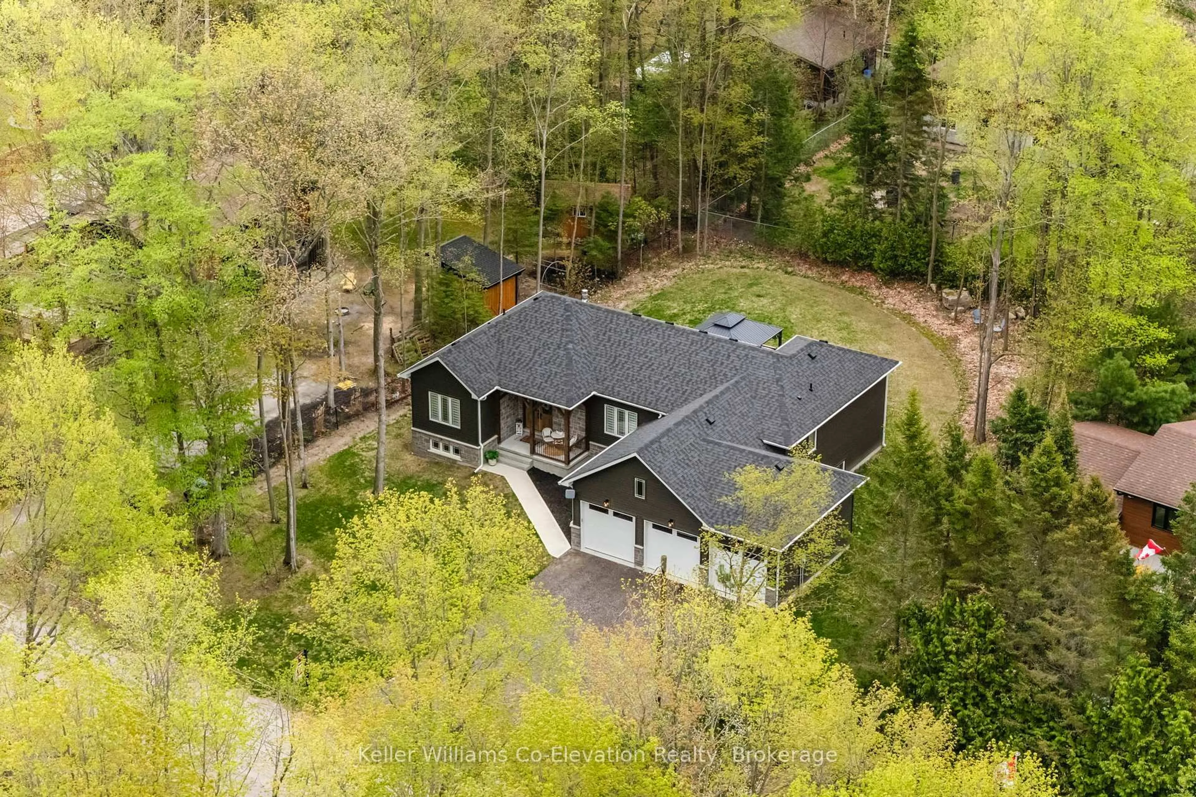 A pic from outside/outdoor area/front of a property/back of a property/a pic from drone, forest/trees view for 15 Pinecone Ave, Tiny Ontario L9M 0J2