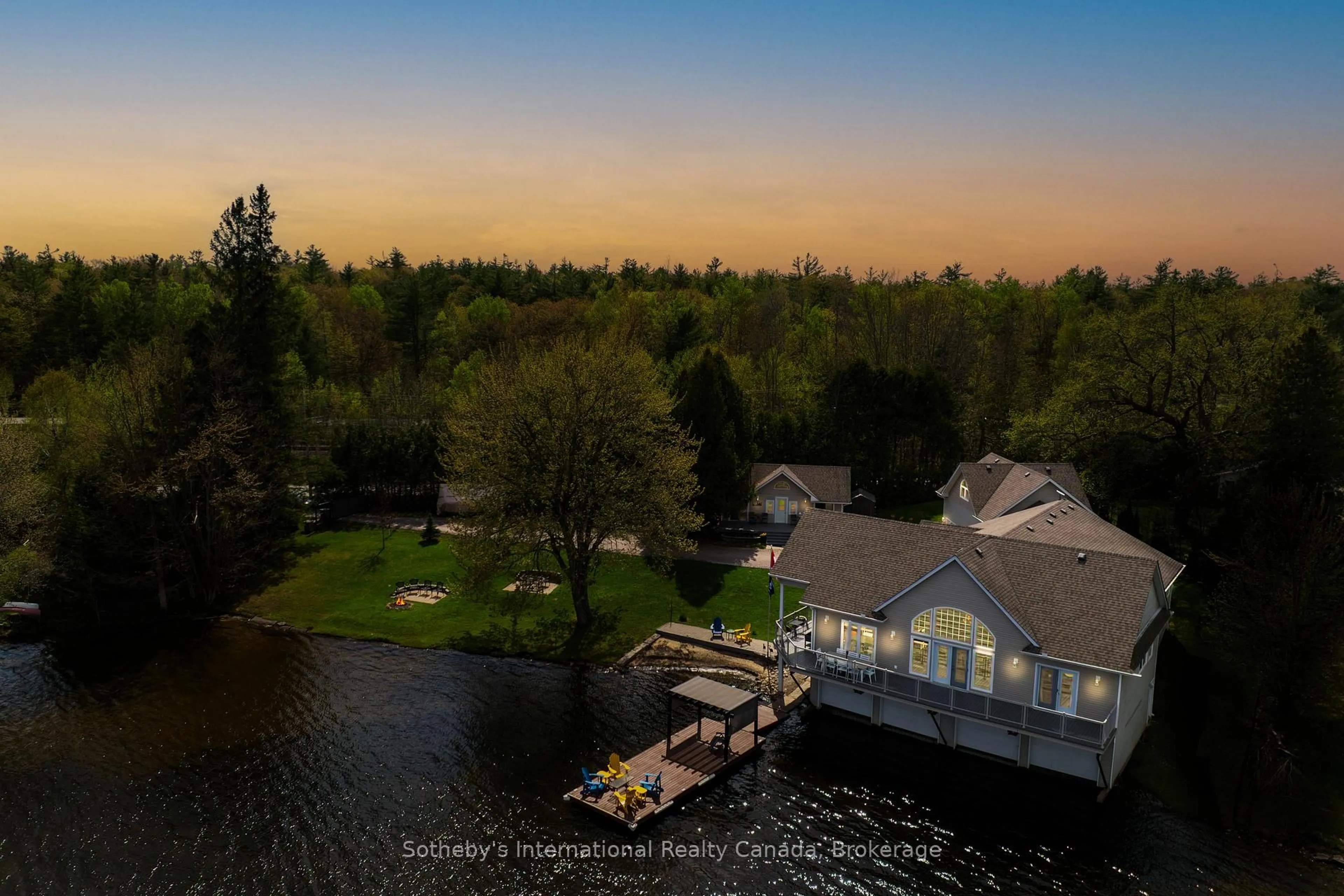 A pic from outside/outdoor area/front of a property/back of a property/a pic from drone, water/lake/river/ocean view for 1601 Port Stanton Pkwy, Severn Ontario P0E 1N0