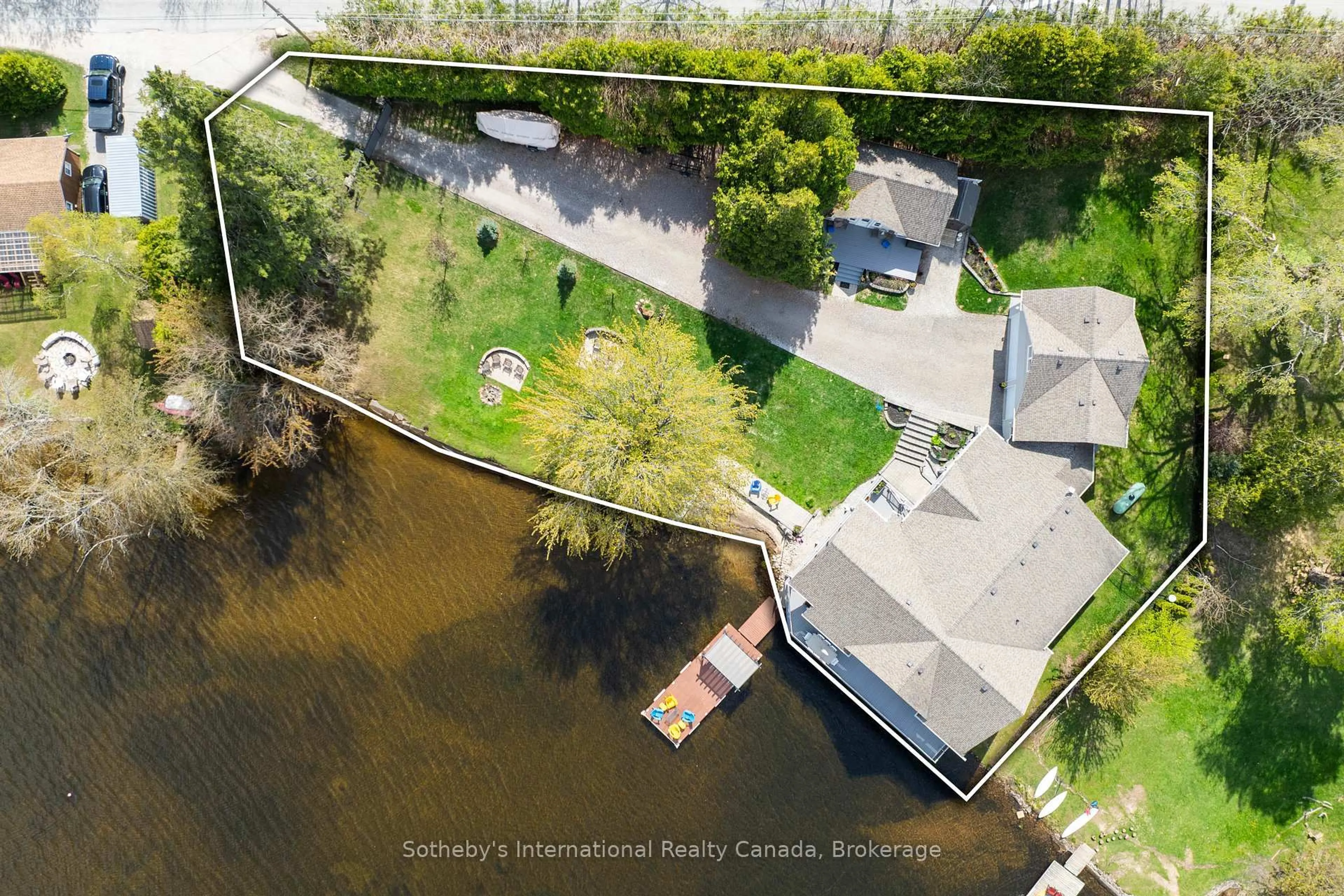A pic from outside/outdoor area/front of a property/back of a property/a pic from drone, water/lake/river/ocean view for 1601 Port Stanton Pkwy, Severn Ontario P0E 1N0