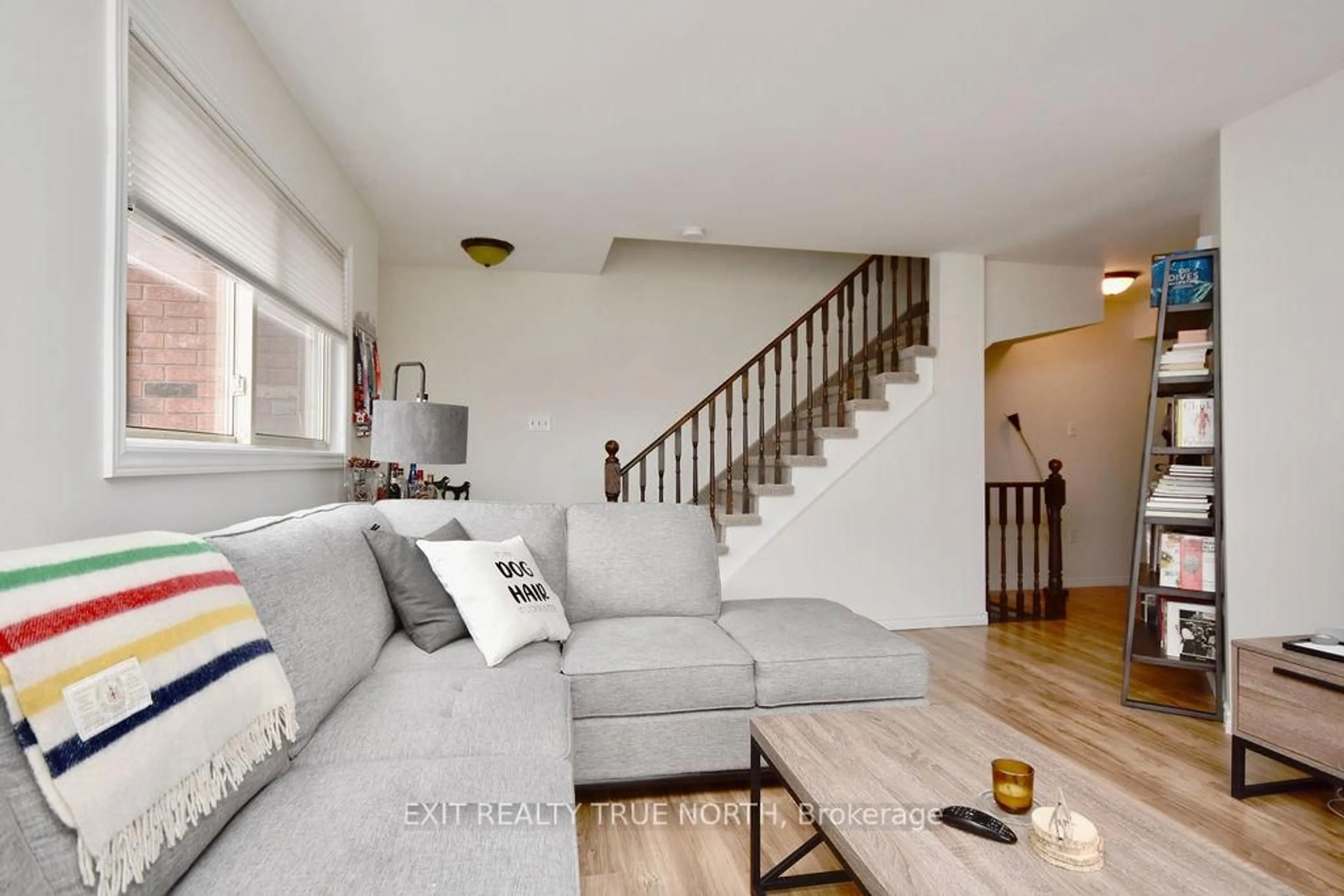 Living room with furniture, unknown for 3 Sawmill Rd #7, Barrie Ontario L4N 6X3