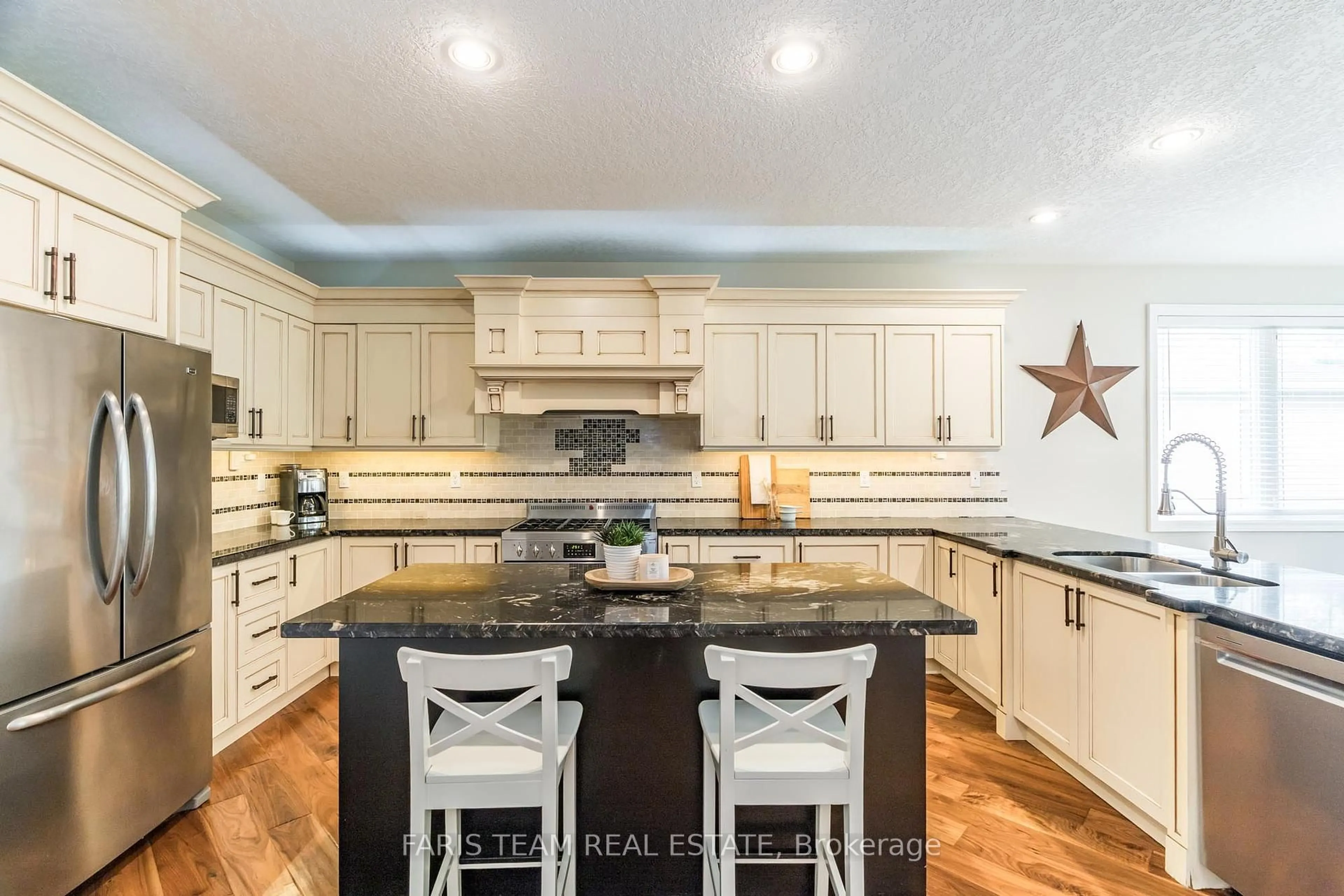 Open concept kitchen, ceramic/tile floor for 9 Priscilla St, Tiny Ontario L0L 2T0