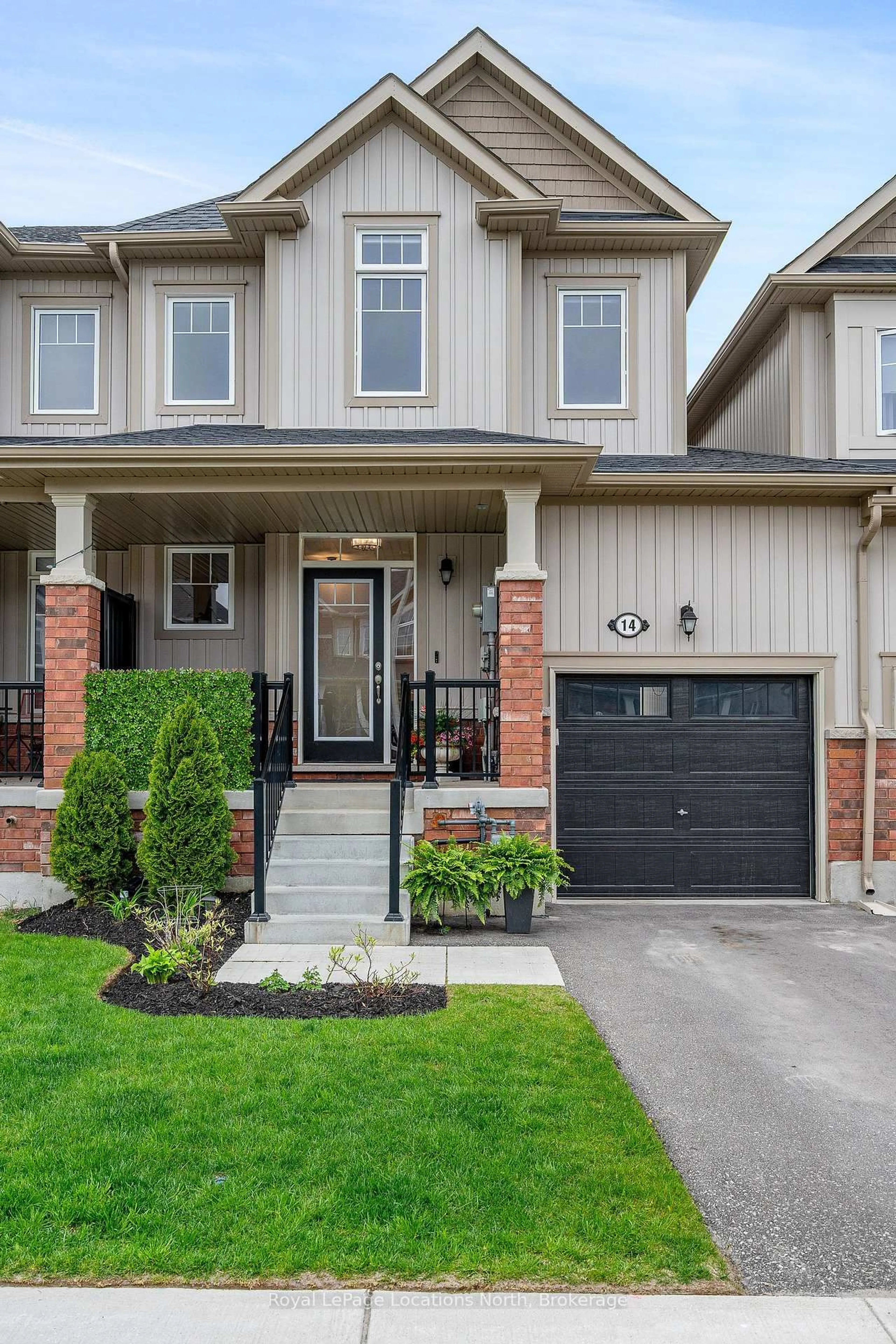 Home with brick exterior material, street for 14 Bailey St, Collingwood Ontario L9Y 3W8