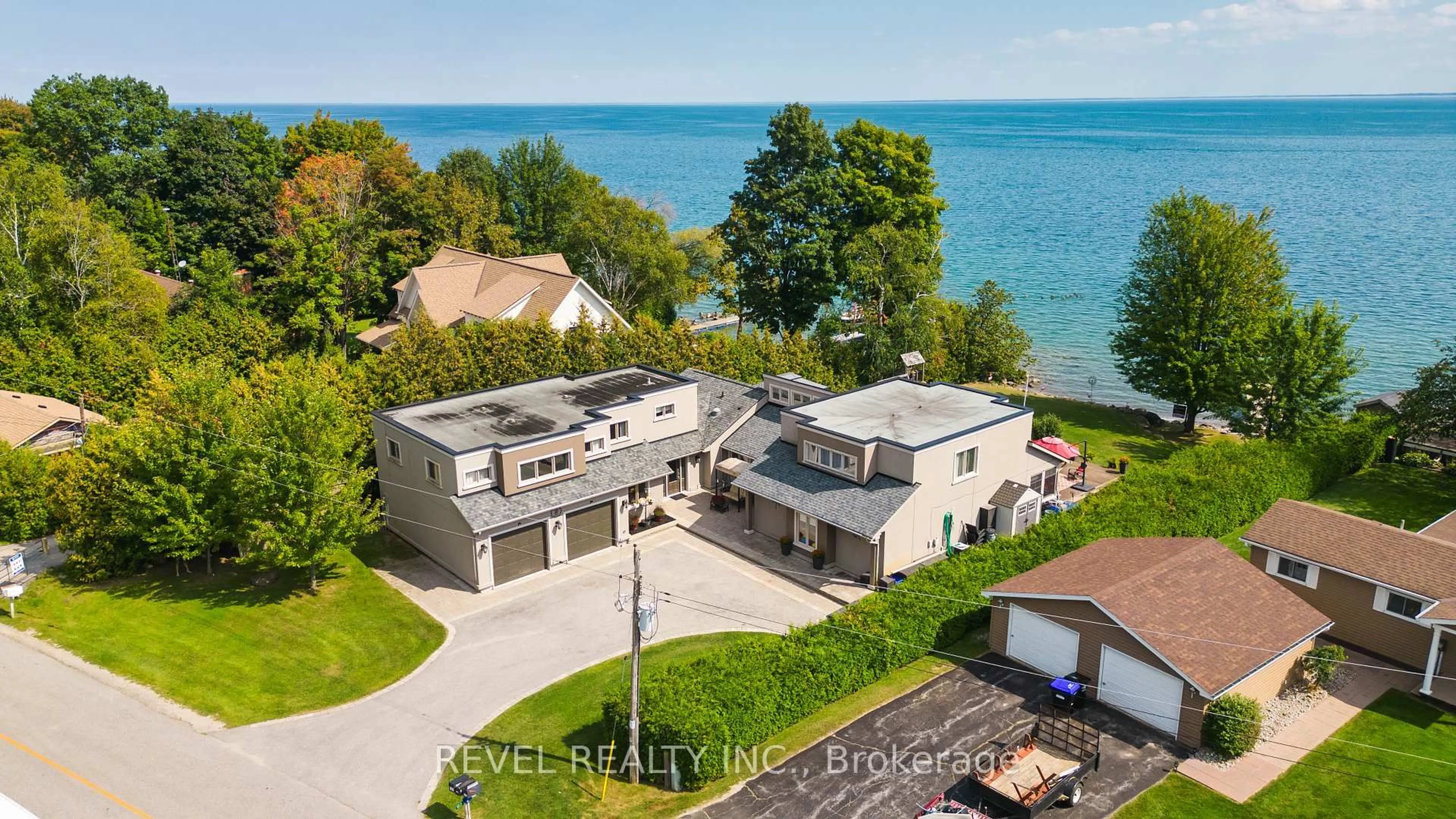 A pic from outside/outdoor area/front of a property/back of a property/a pic from drone, water/lake/river/ocean view for 183 Lakeshore Rd, Oro-Medonte Ontario L0L 2E0