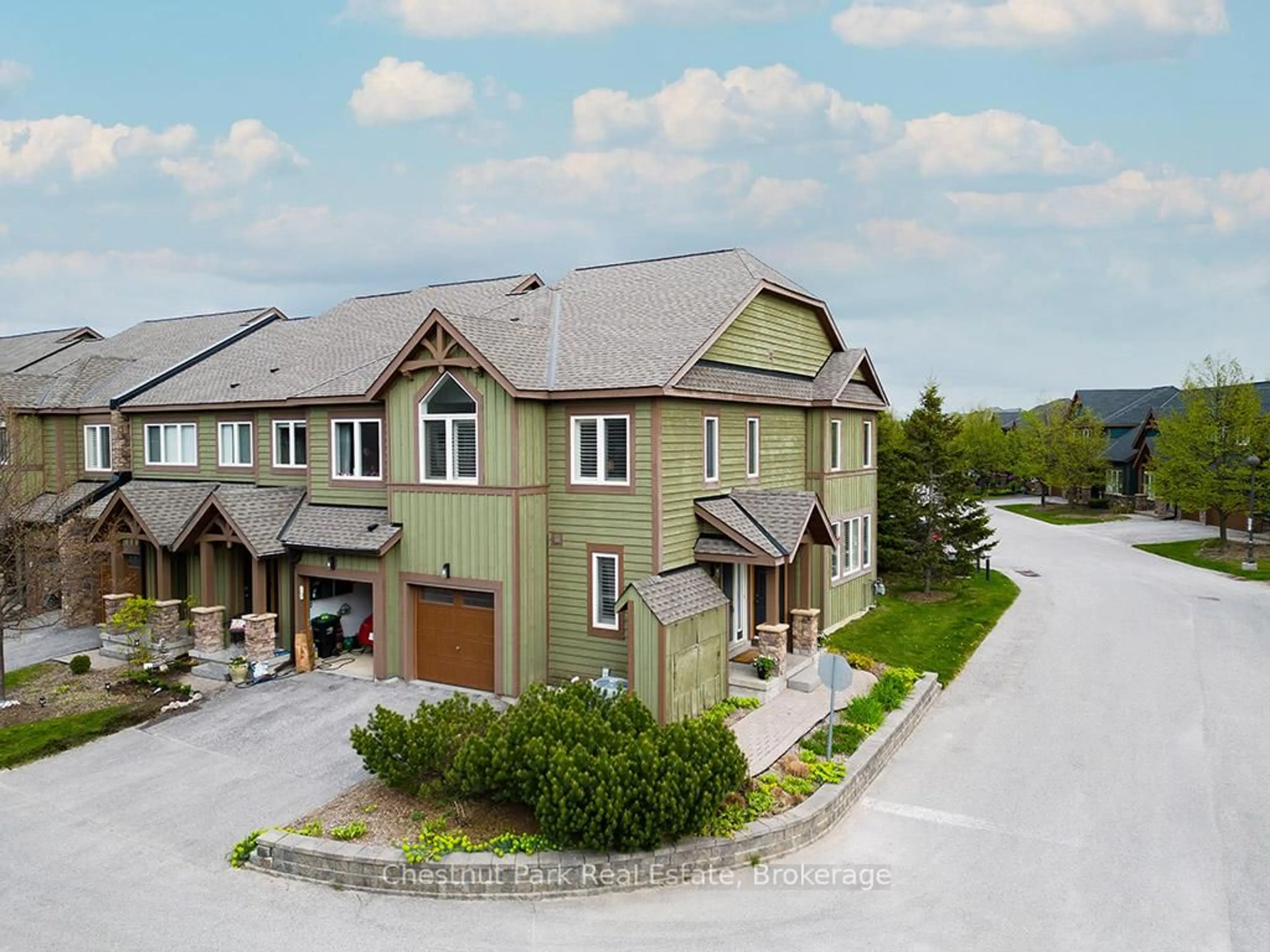 A pic from outside/outdoor area/front of a property/back of a property/a pic from drone, street for 57 Joseph Tr, Collingwood Ontario L9Y 0J3