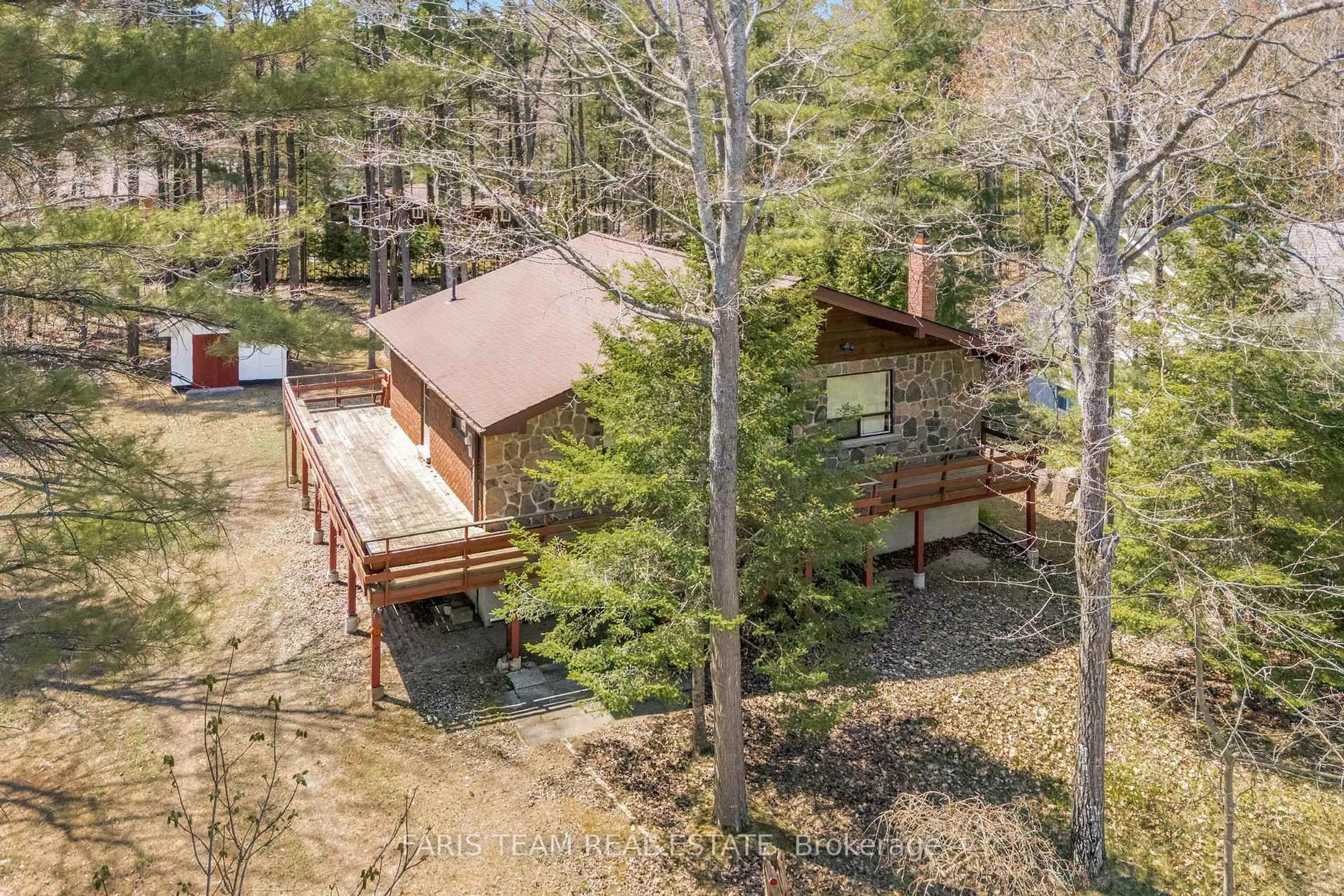A pic from outside/outdoor area/front of a property/back of a property/a pic from drone, forest/trees view for 39 Rosemary Rd, Tiny Ontario L0L 2T0