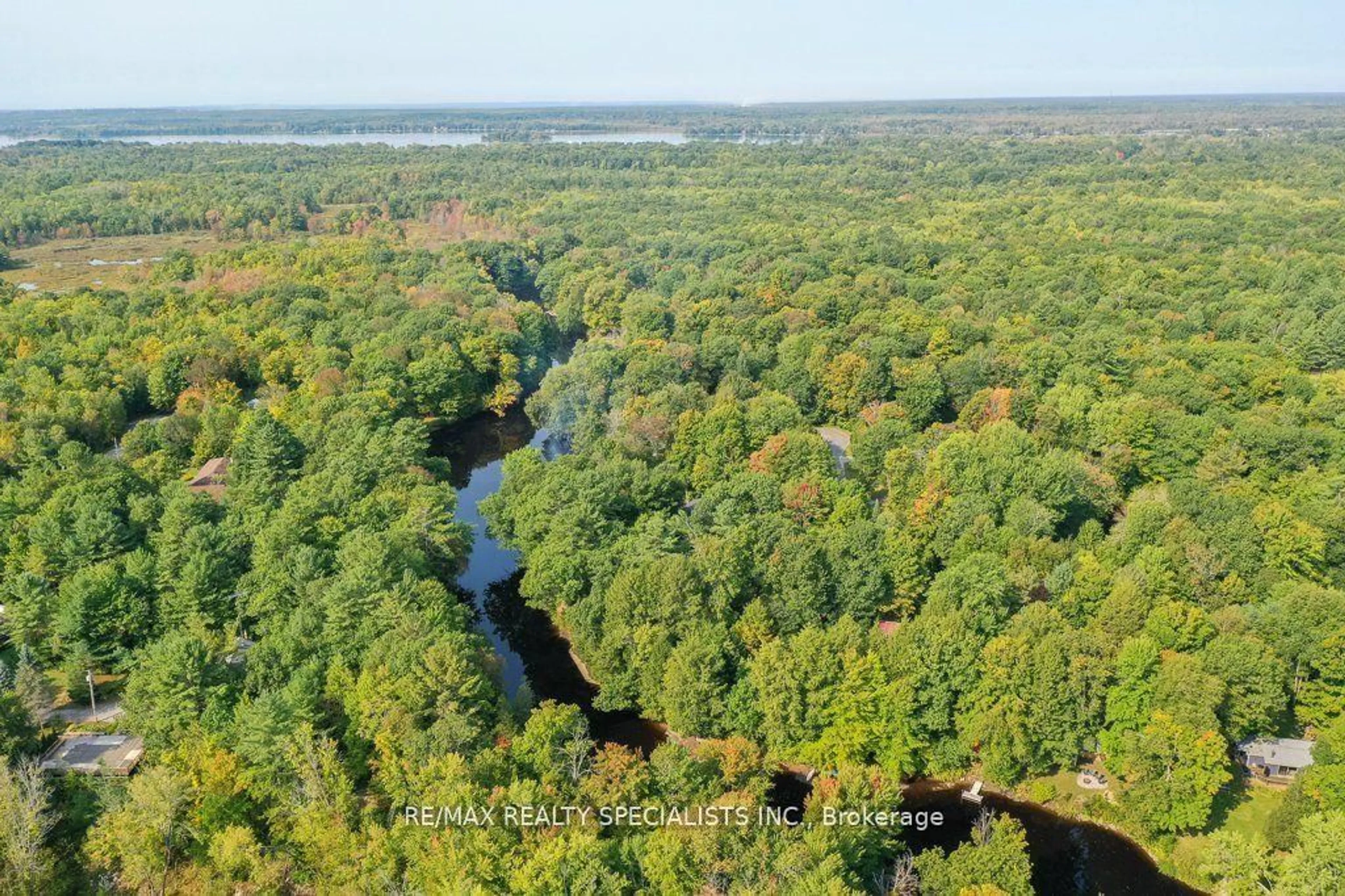 A pic from outside/outdoor area/front of a property/back of a property/a pic from drone, water/lake/river/ocean view for 7468 Ash Cres, Ramara Ontario L0K 2B0
