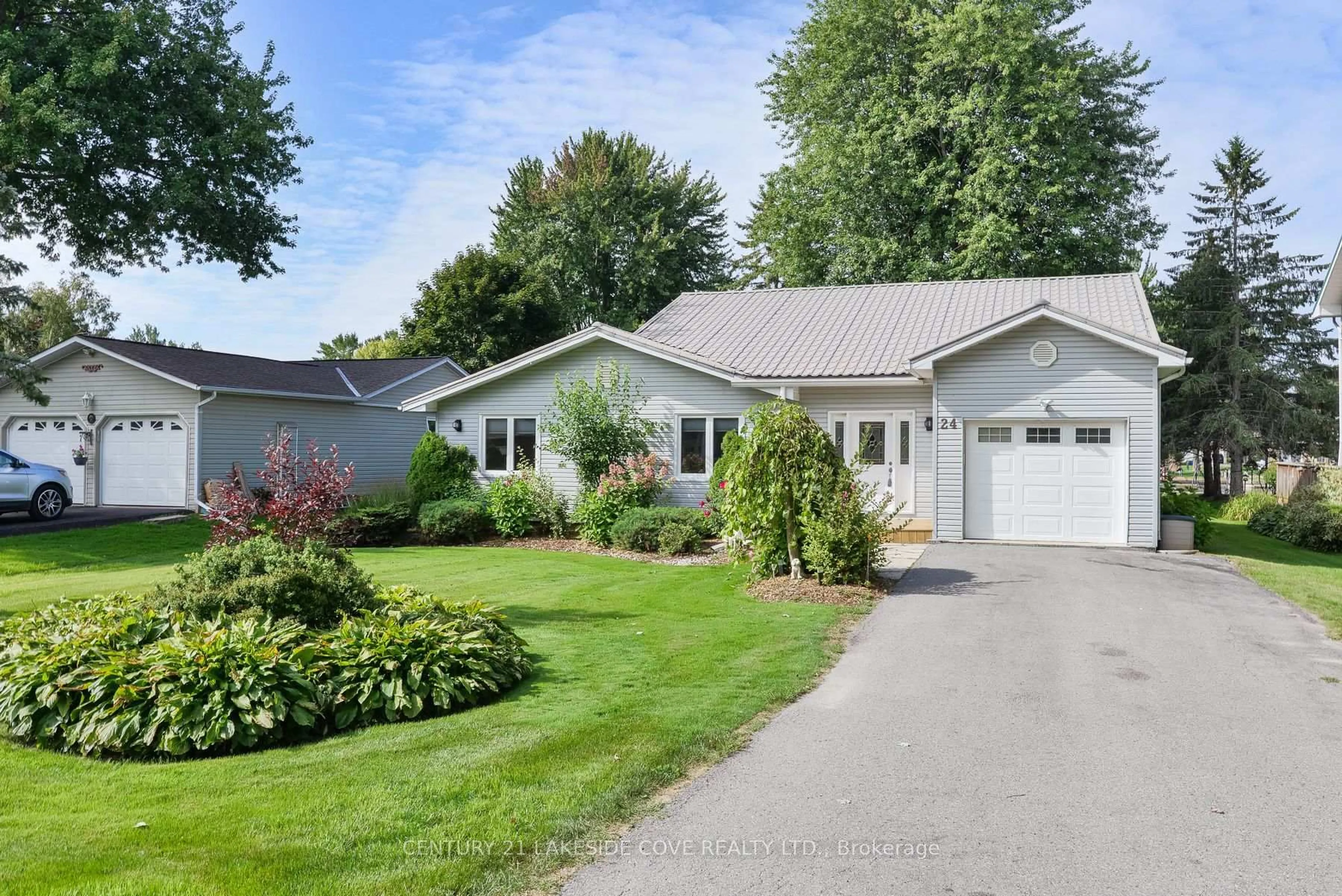 Home with vinyl exterior material, street for 24 Turtle Path, Ramara Ontario L0K 1B0