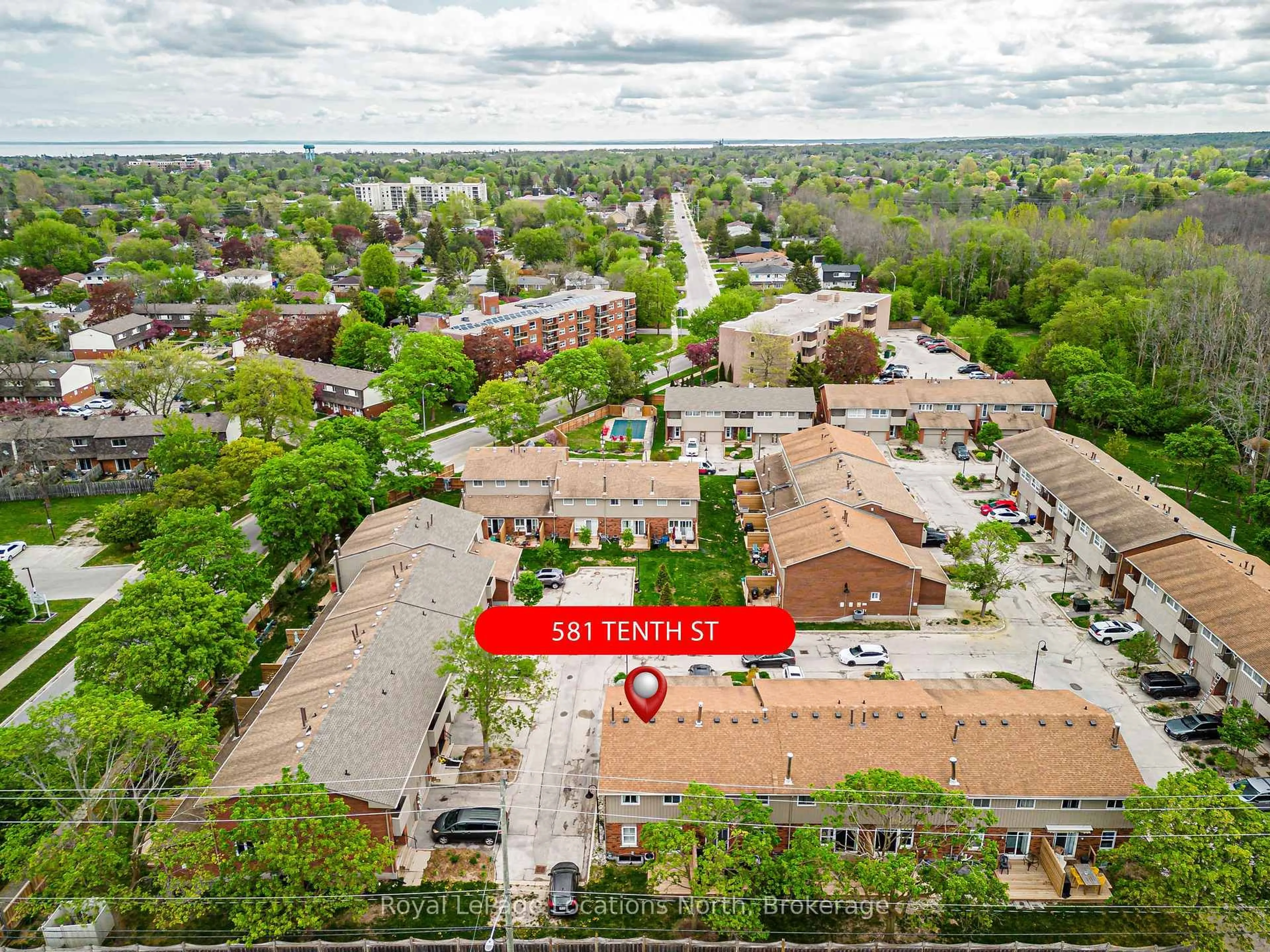 A pic from outside/outdoor area/front of a property/back of a property/a pic from drone, city buildings view from balcony for 581 Tenth St, Collingwood Ontario L9Y 4K6