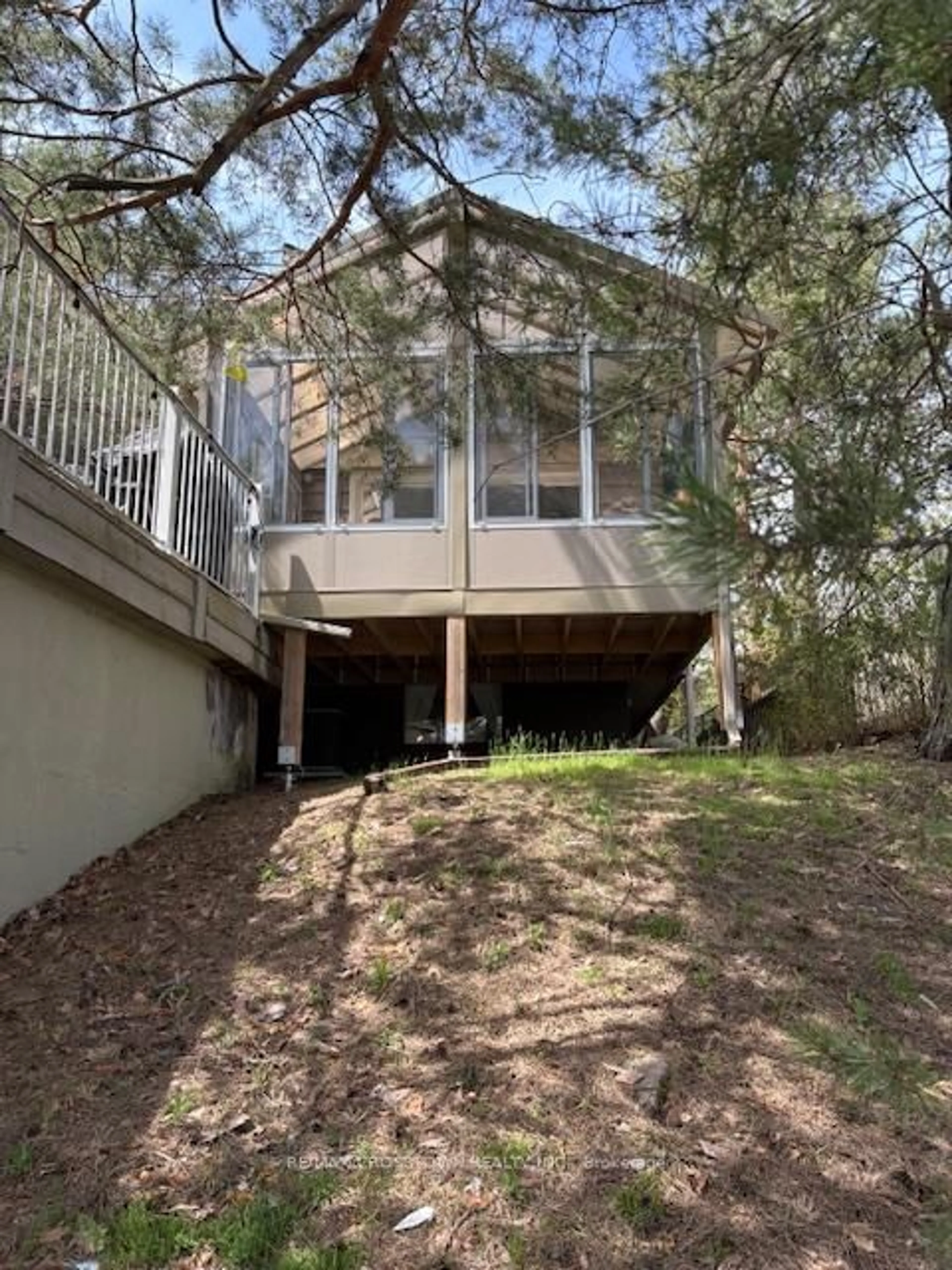 A pic from outside/outdoor area/front of a property/back of a property/a pic from drone, unknown for 799 Mosley St, Wasaga Beach Ontario L9Z 2H5